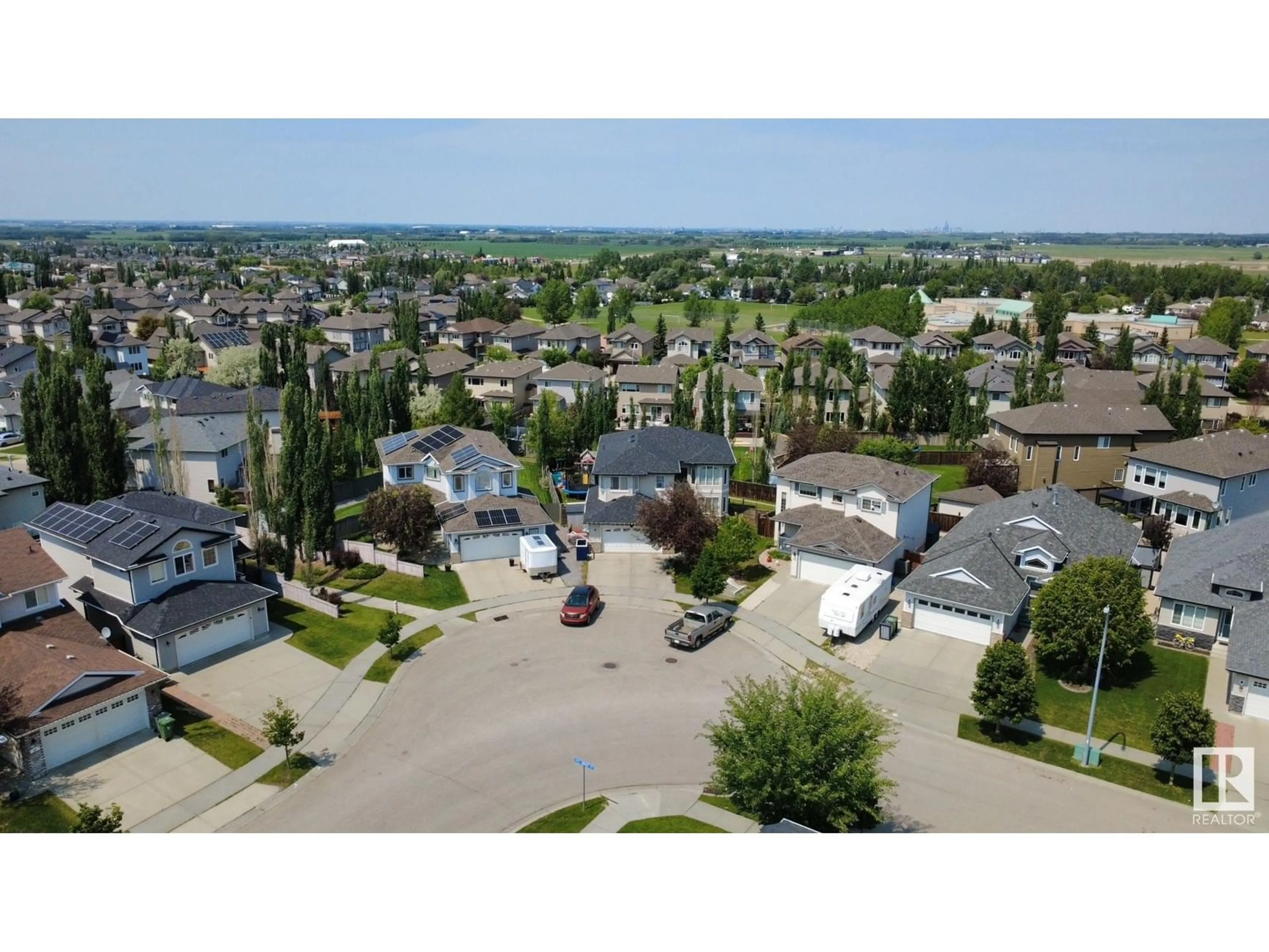 A pic from outside/outdoor area/front of a property/back of a property/a pic from drone, street for 32 CARRIERE CR, Beaumont Alberta T4X0A8