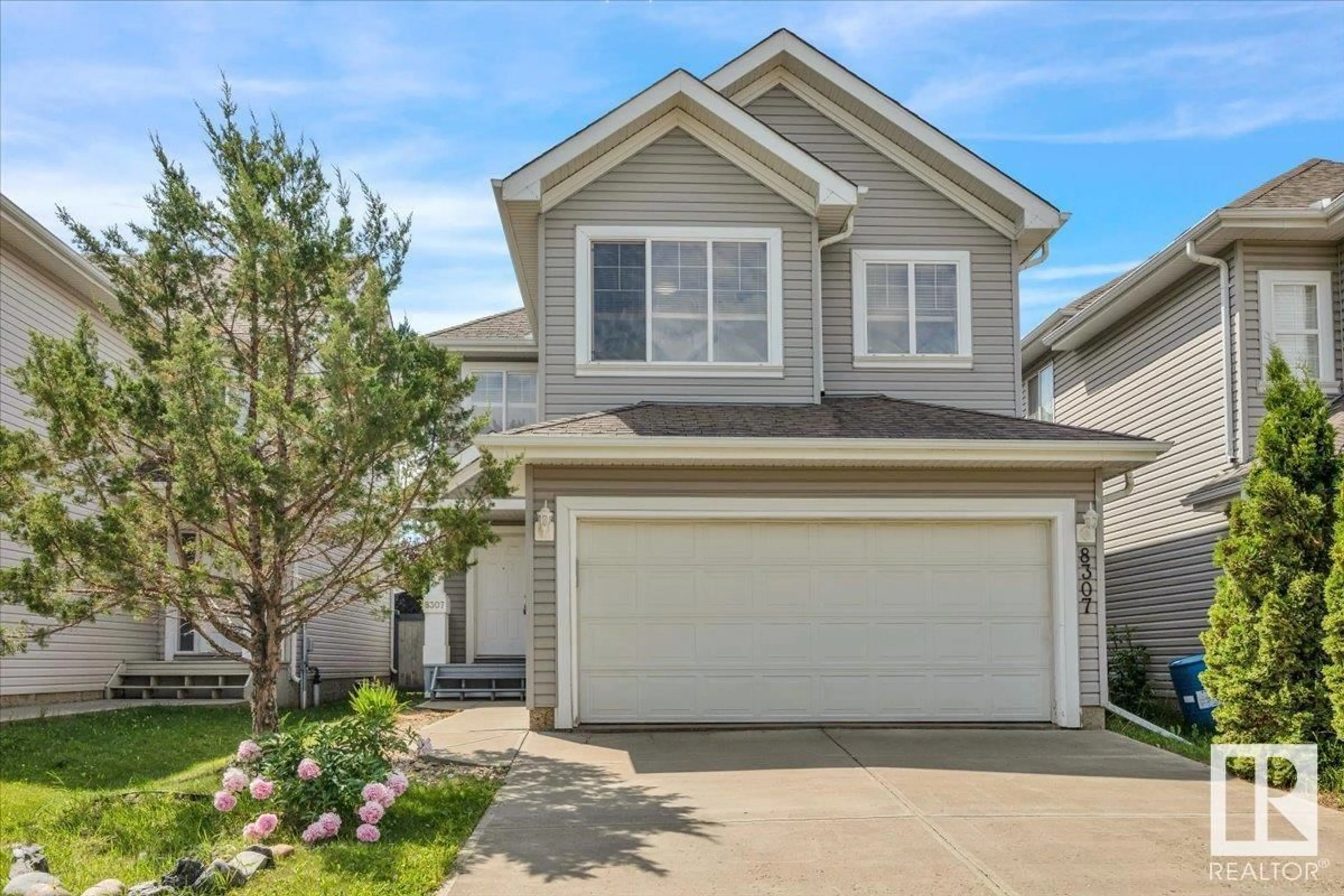 Home with vinyl exterior material, street for 8307 11 AV, Edmonton Alberta T6X1E3