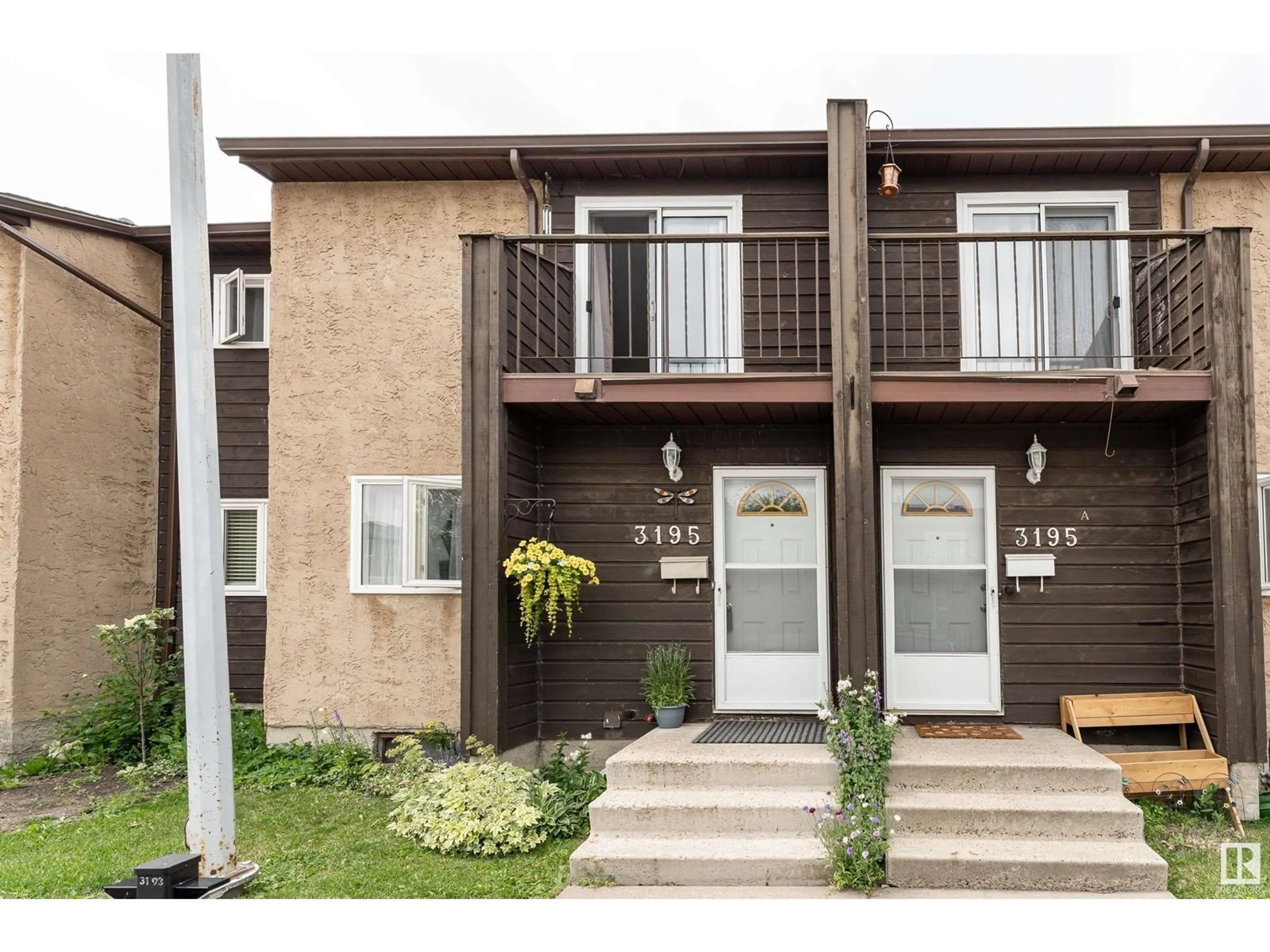 Home with vinyl exterior material, street for 3195 139 AV, Edmonton Alberta T5Y1R4