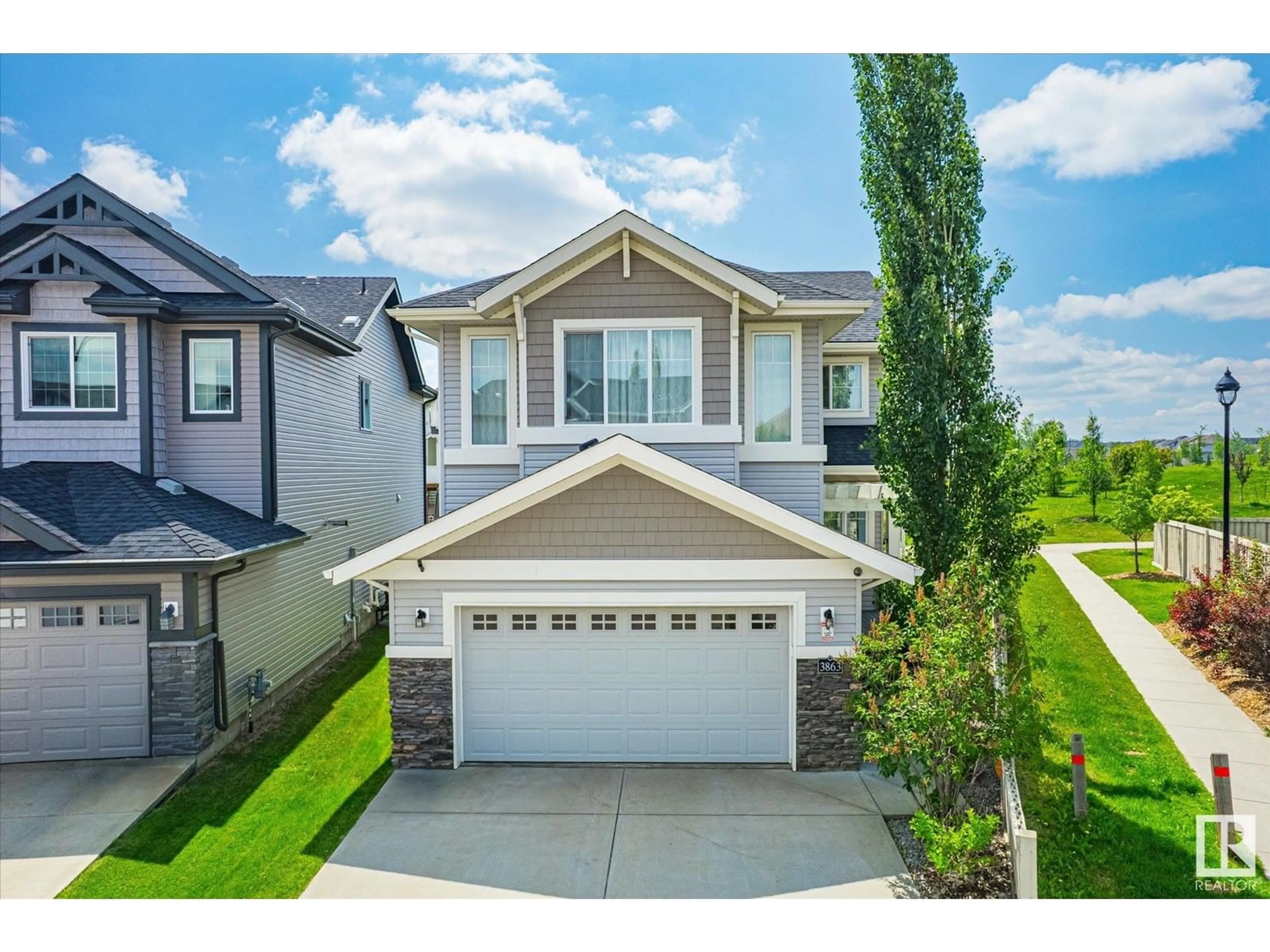 Home with vinyl exterior material, street for 3863 AGAR GR, Edmonton Alberta T6W0W9