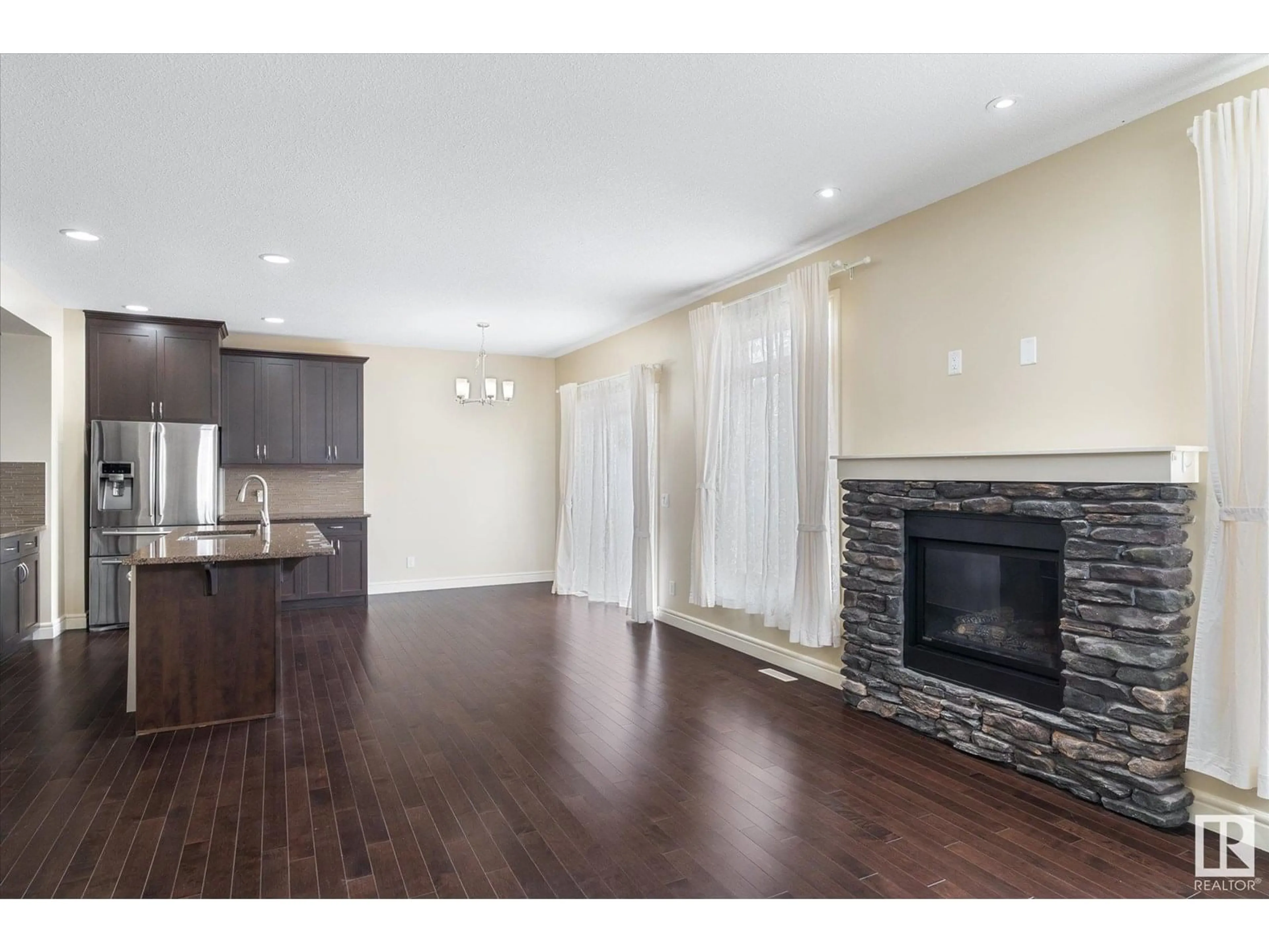 Open concept kitchen, wood/laminate floor for 3863 AGAR GR, Edmonton Alberta T6W0W9