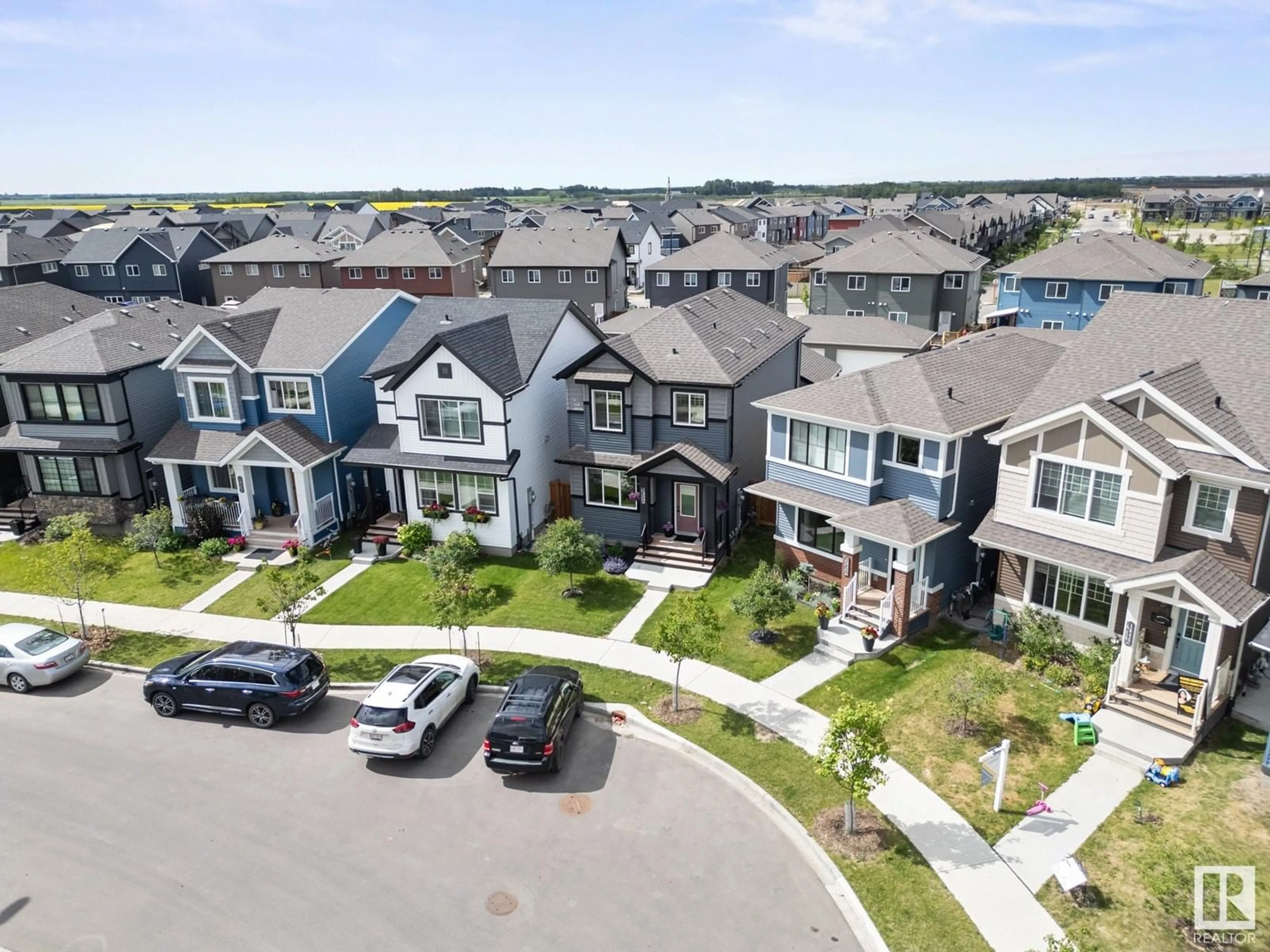 A pic from outside/outdoor area/front of a property/back of a property/a pic from drone, mountain view for CI SW - 1649 PLUM CIRCLE, Edmonton Alberta T6X2Y5