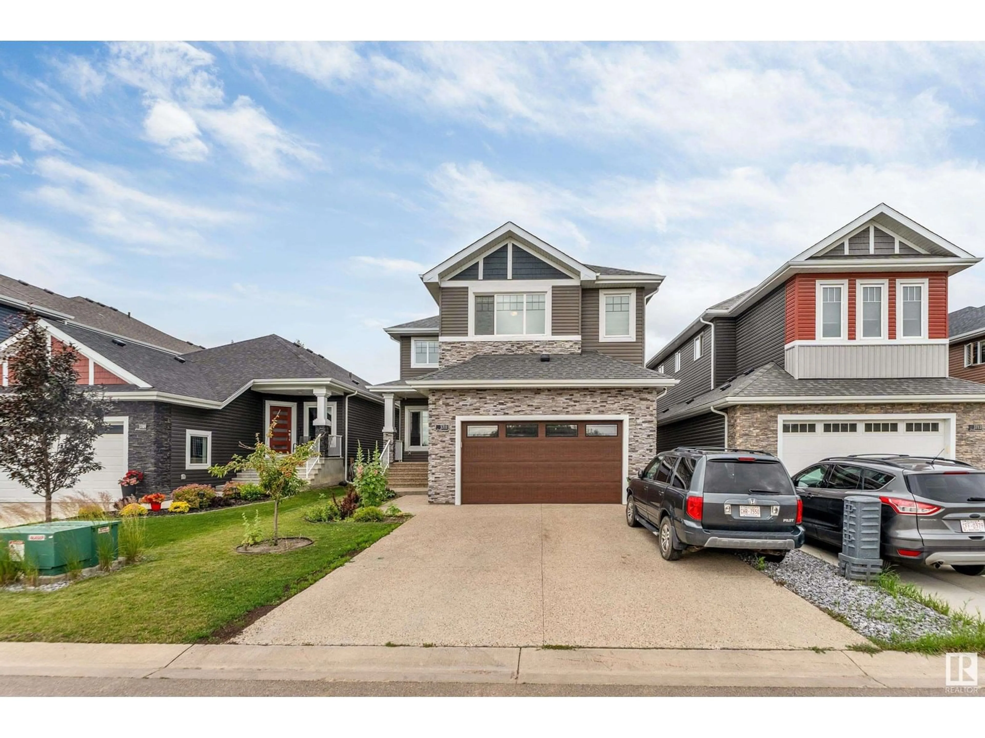 Home with vinyl exterior material, street for 3711 HUMMINGBIRD WY, Edmonton Alberta T5S0M9