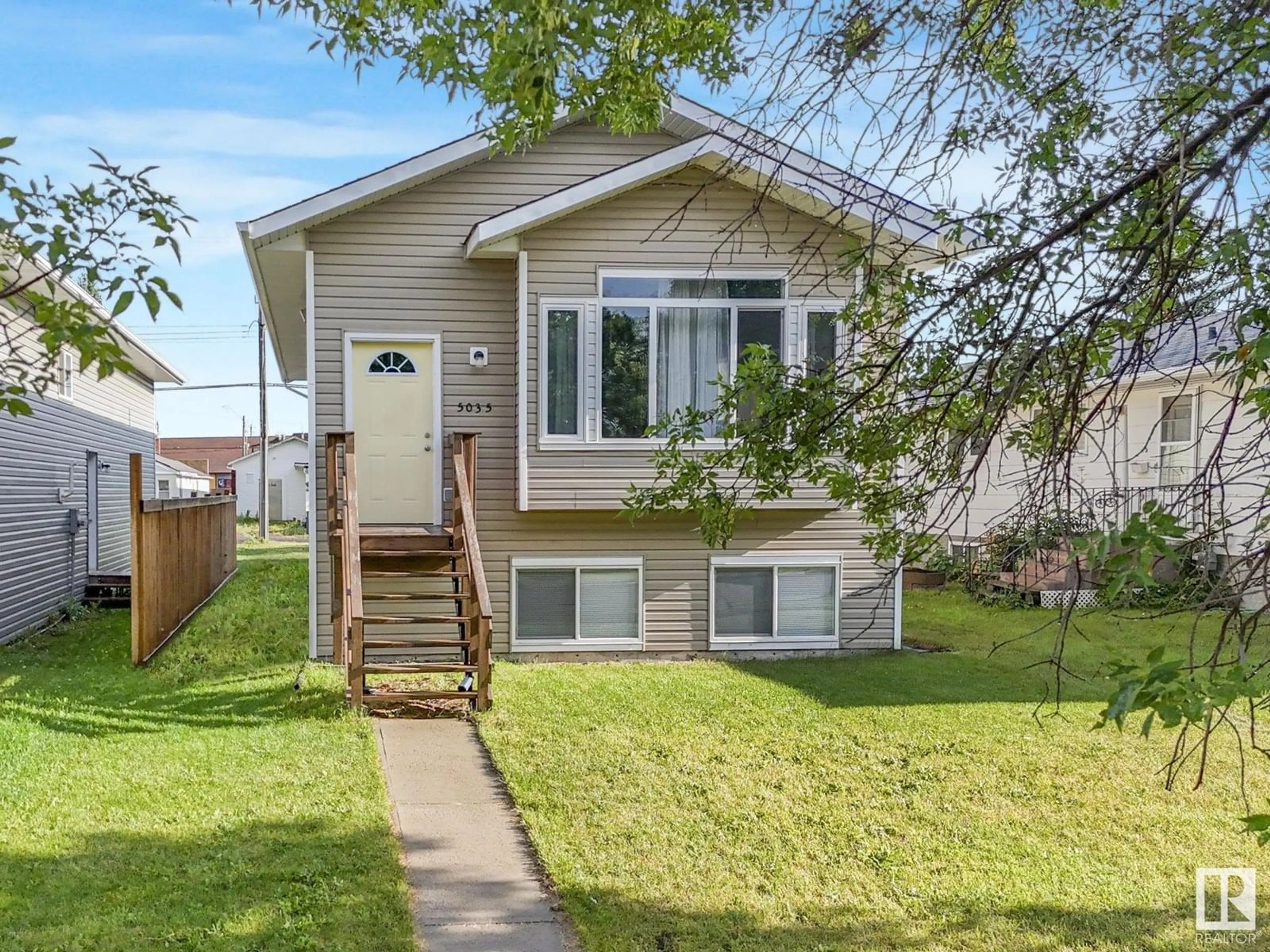 Home with vinyl exterior material, street for 5035 51 AV, Lamont Alberta T0B2R0