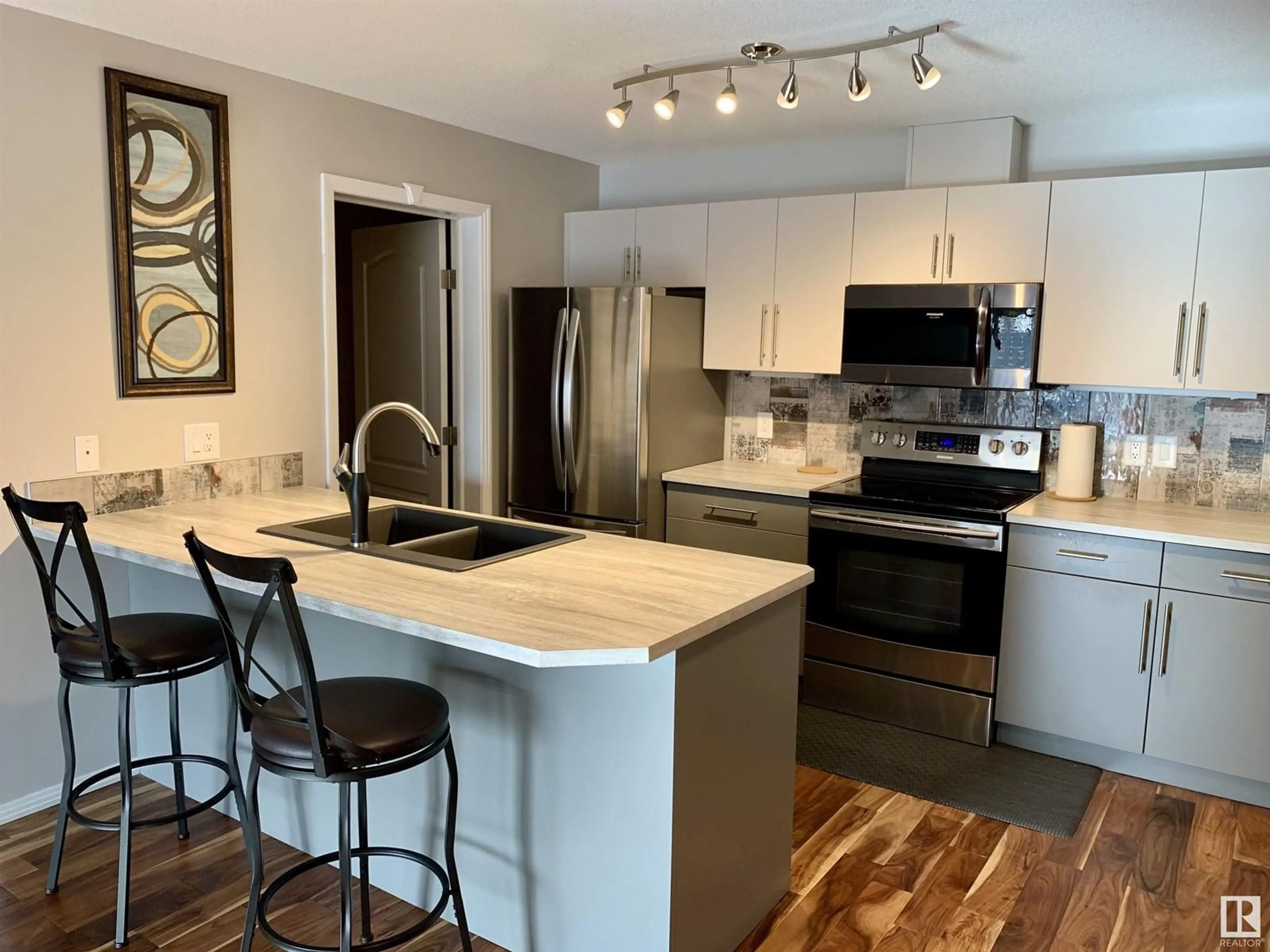 Open concept kitchen, unknown for 230 592 HOOKE RD NW, Edmonton Alberta T5A5H2