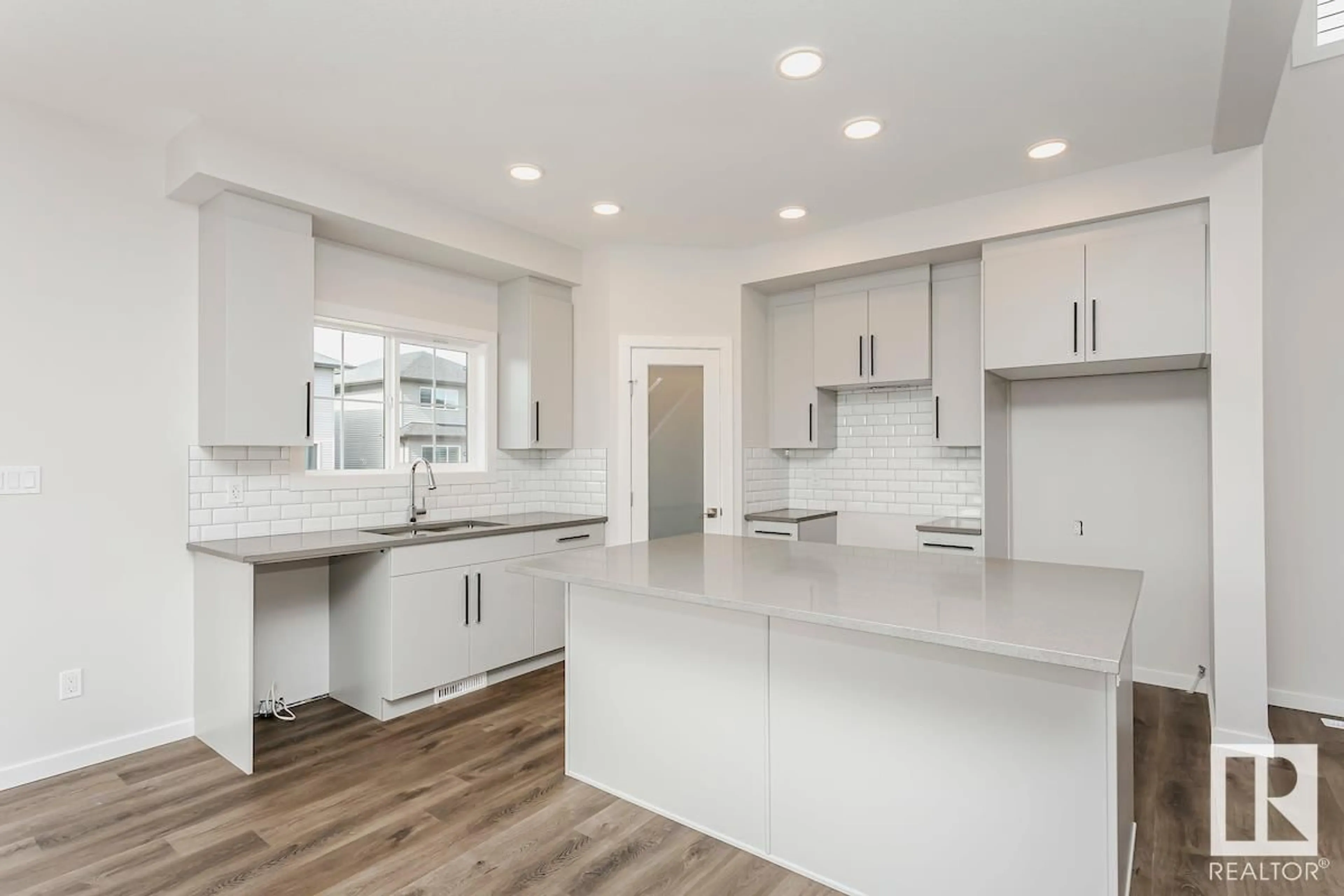 Open concept kitchen, ceramic/tile floor for 17408 2 ST, Edmonton Alberta T5Y4G6
