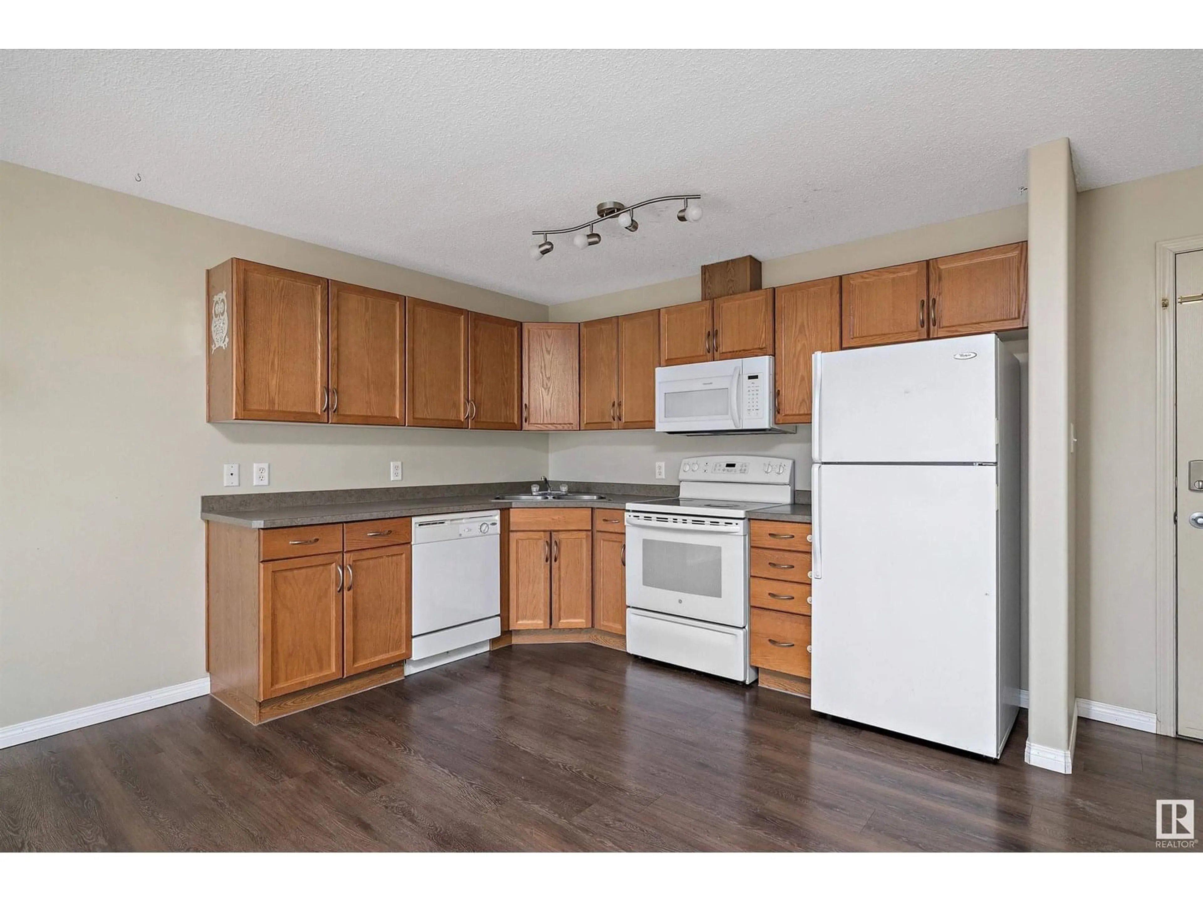 Standard kitchen, wood/laminate floor for #404 - 309 CLAREVIEW STATION DR, Edmonton Alberta T5Y0J4