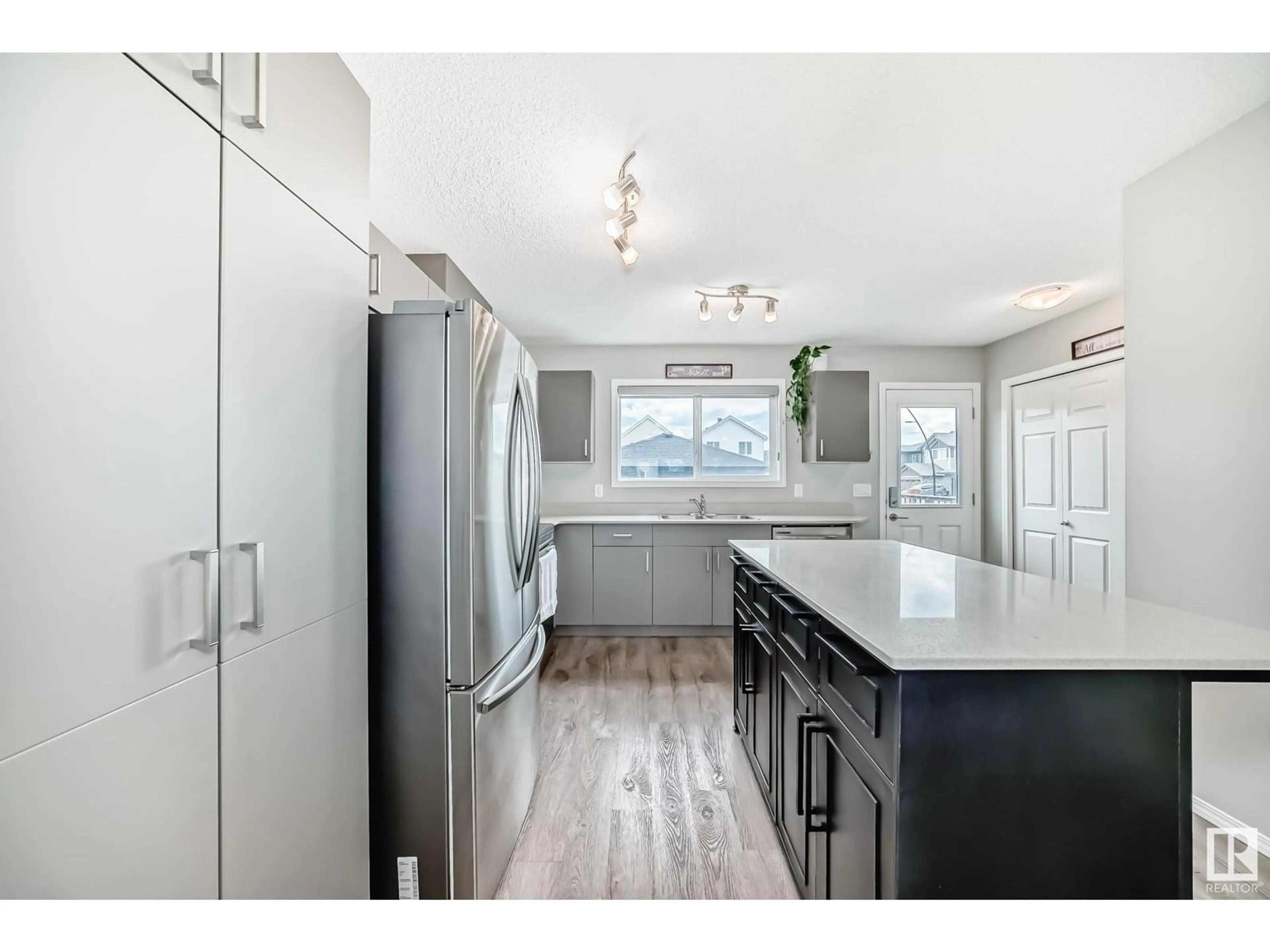 Open concept kitchen, unknown for 19327 27 AV, Edmonton Alberta T6M1K9