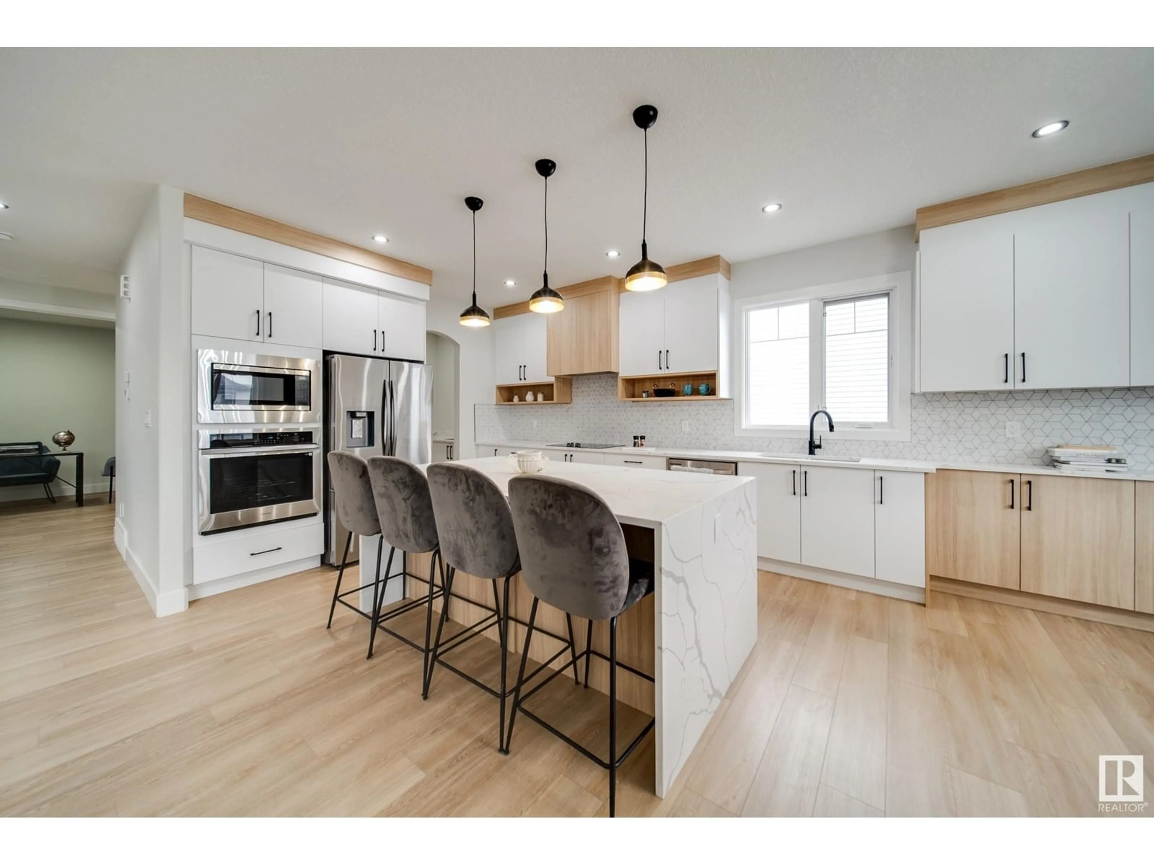 Open concept kitchen, wood/laminate floor for 46 BAKER ST, Ardrossan Alberta T8E0B6
