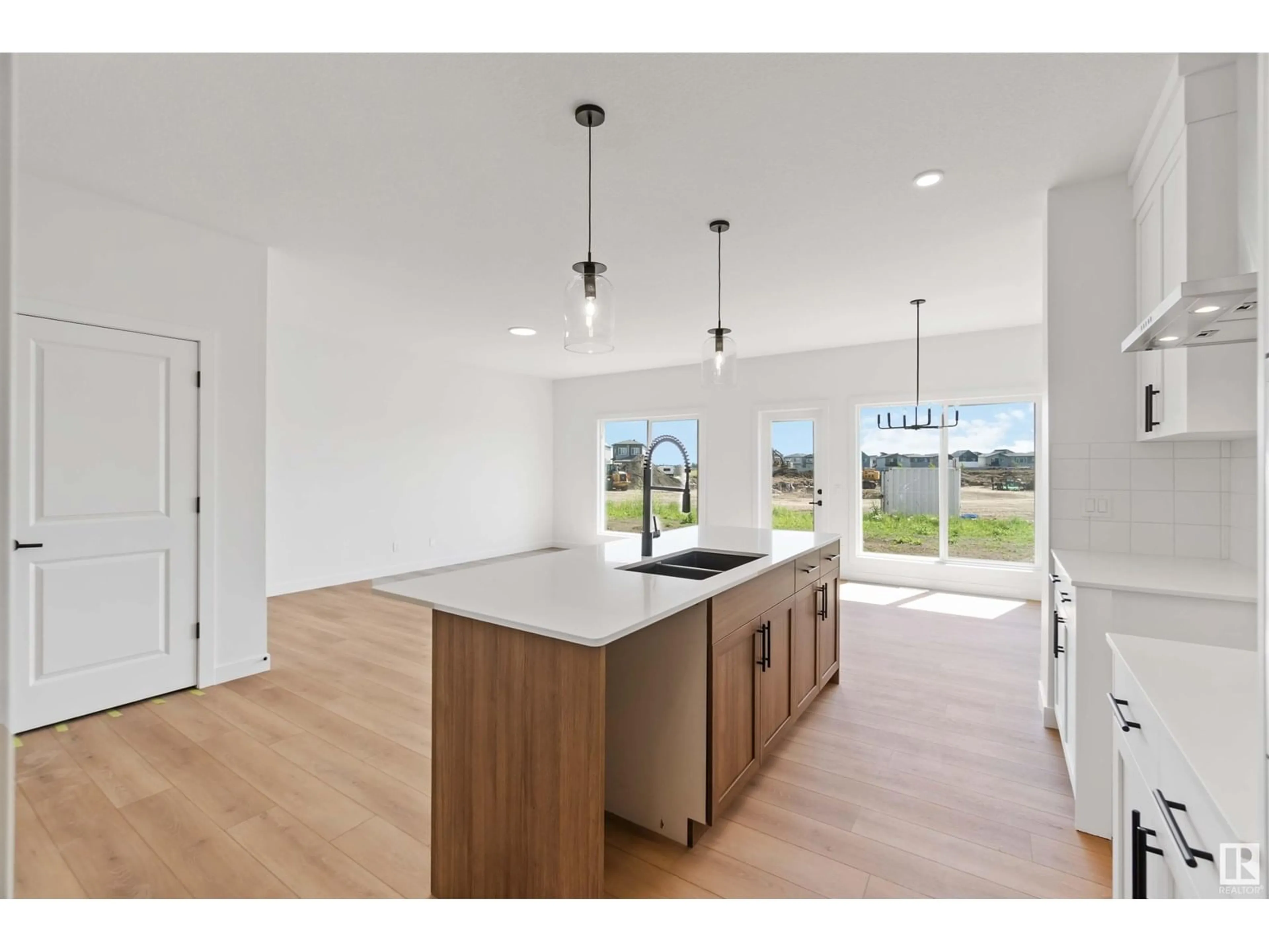 Open concept kitchen, unknown for 18935 28 AV NW, Edmonton Alberta T6M3H9