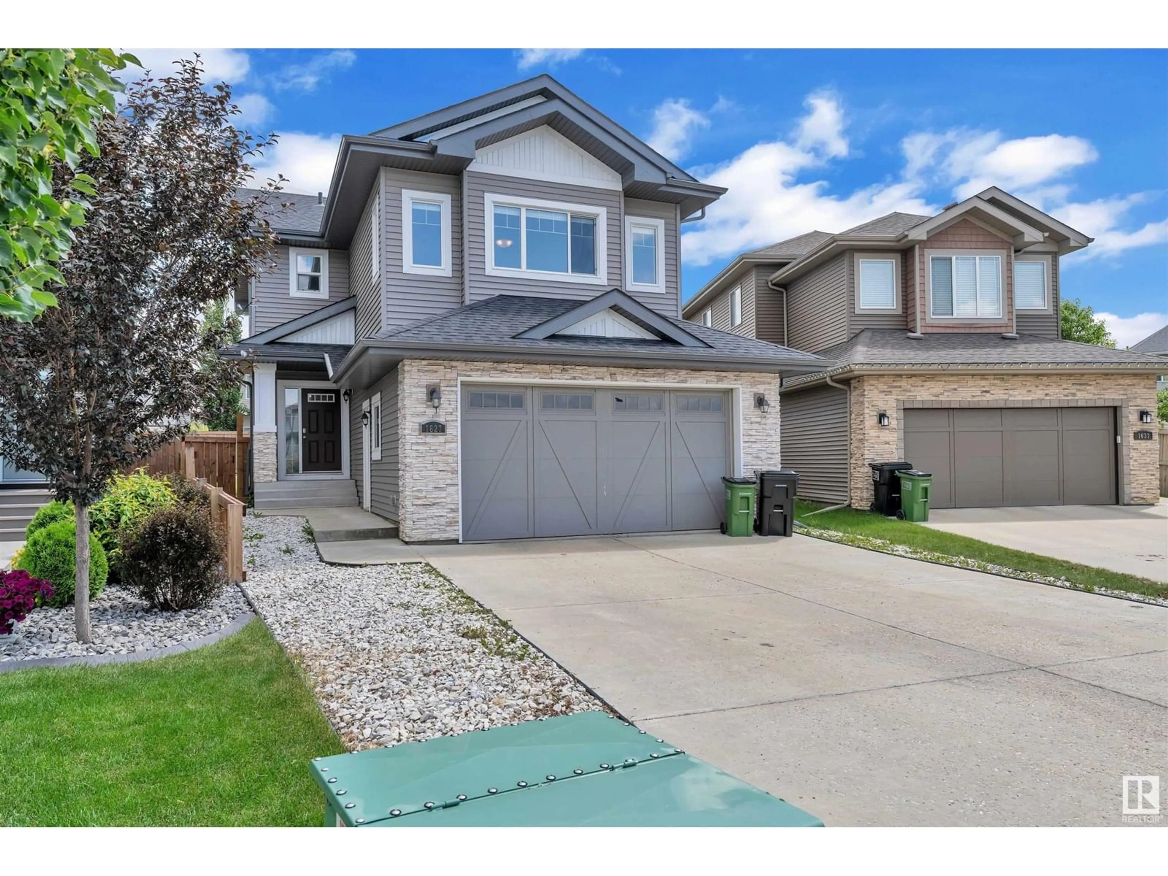 Home with vinyl exterior material, street for SW - 1627 161 ST, Edmonton Alberta T6W3P4