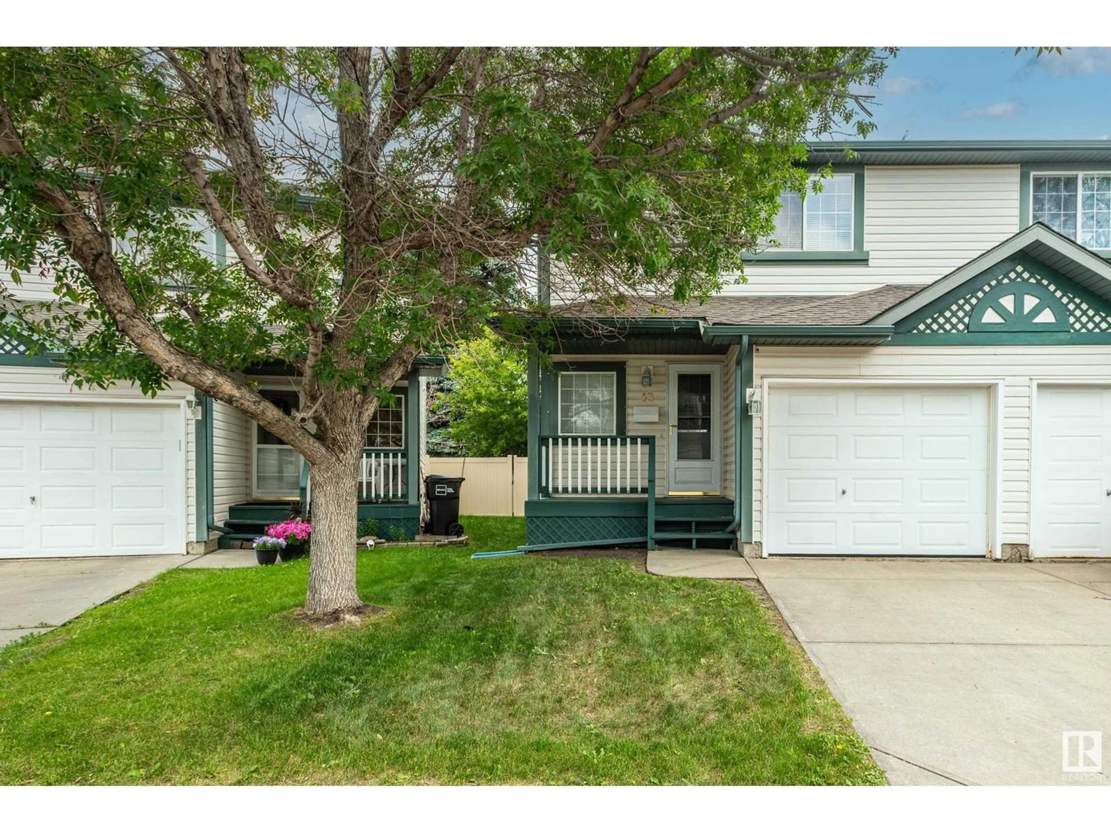 Home with vinyl exterior material, street for #13 - 15215 126 ST, Edmonton Alberta T5X5Z3