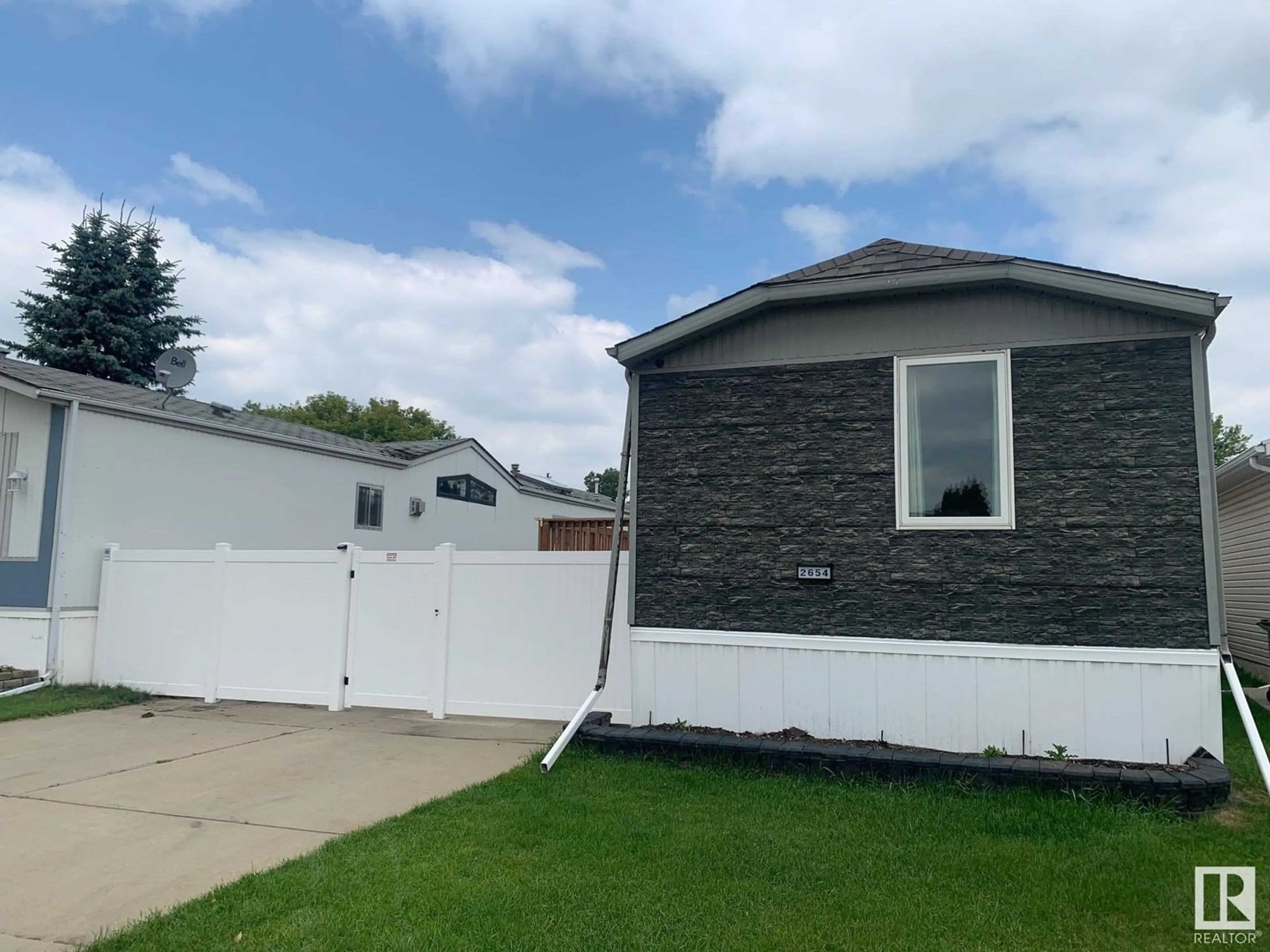 Home with vinyl exterior material, street for 2654 LAKEVIEW DR, Edmonton Alberta T5S1T7