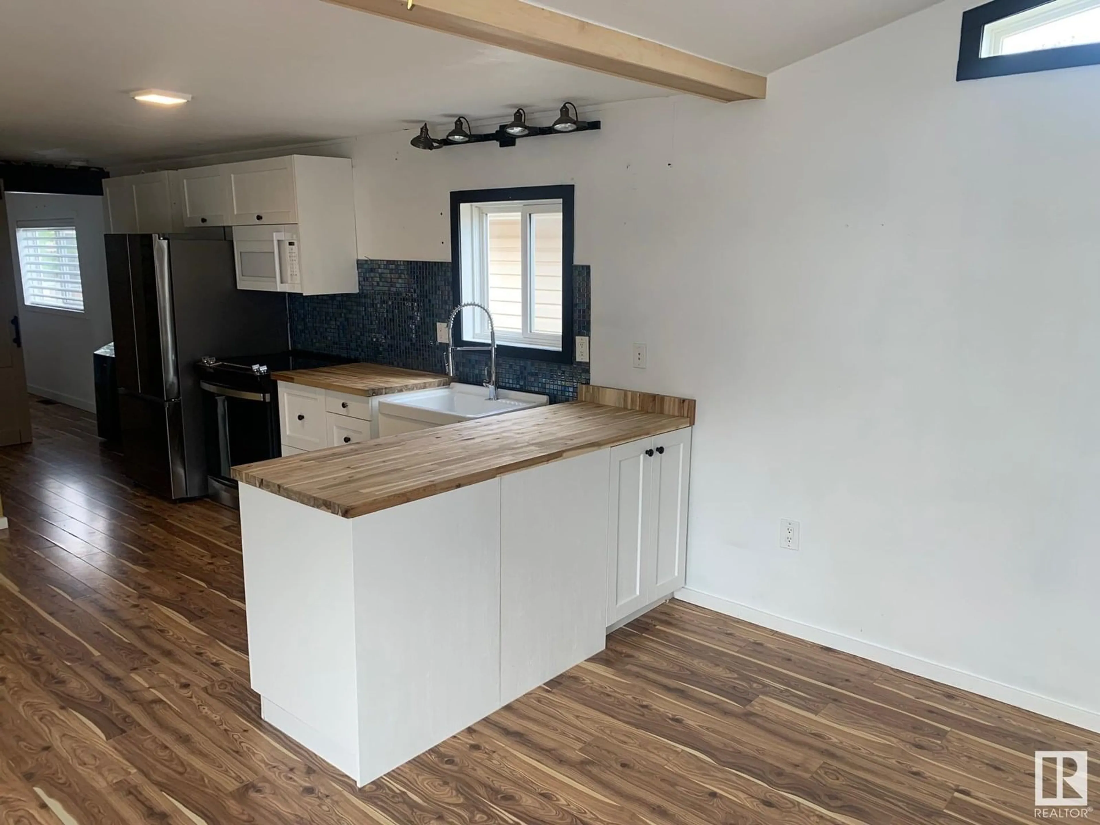 Open concept kitchen, wood/laminate floor for 2654 LAKEVIEW DR, Edmonton Alberta T5S1T7