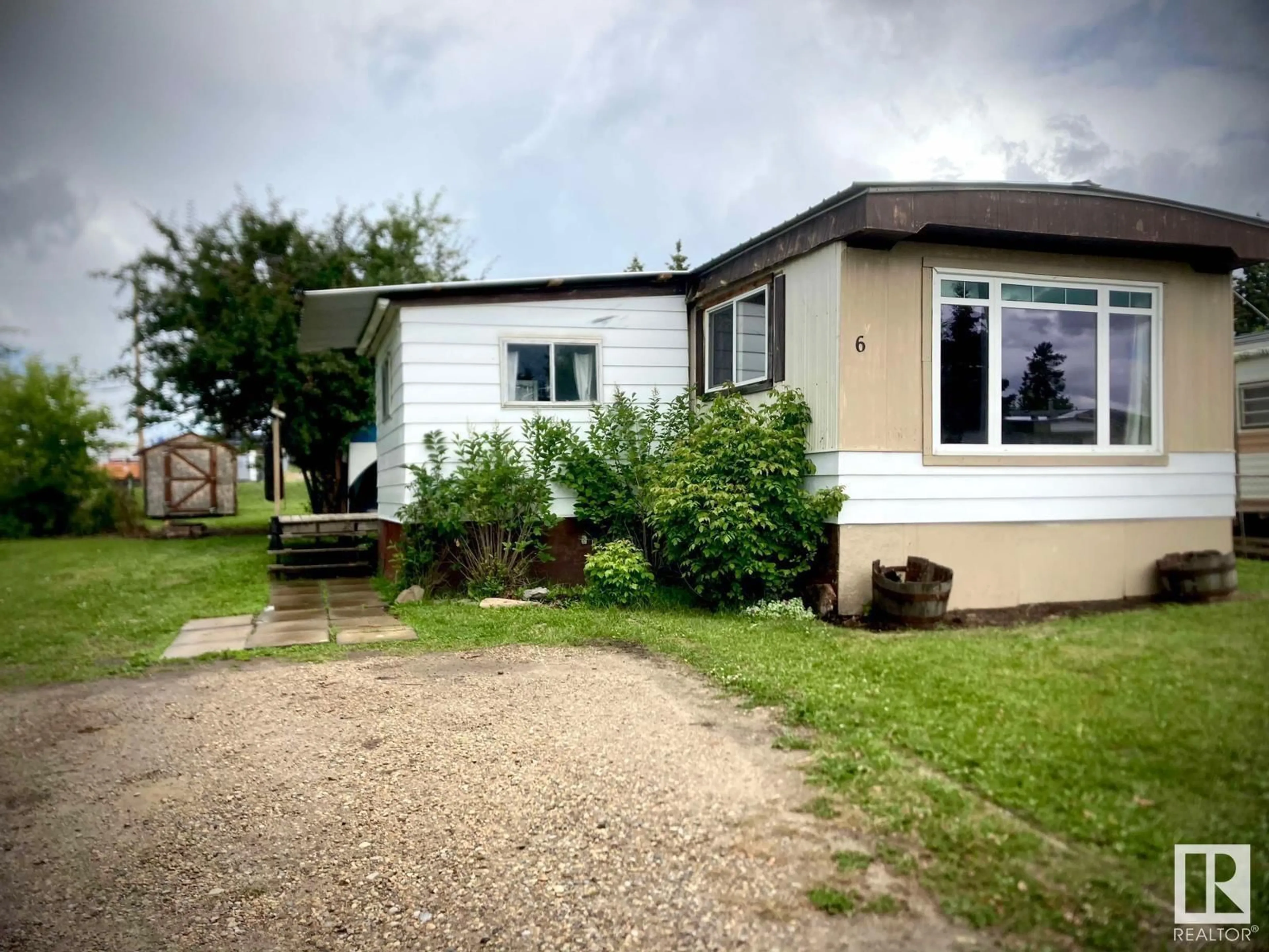 A pic from outside/outdoor area/front of a property/back of a property/a pic from drone, street for 5424 48A AVE, Drayton Valley Alberta T7A1J8