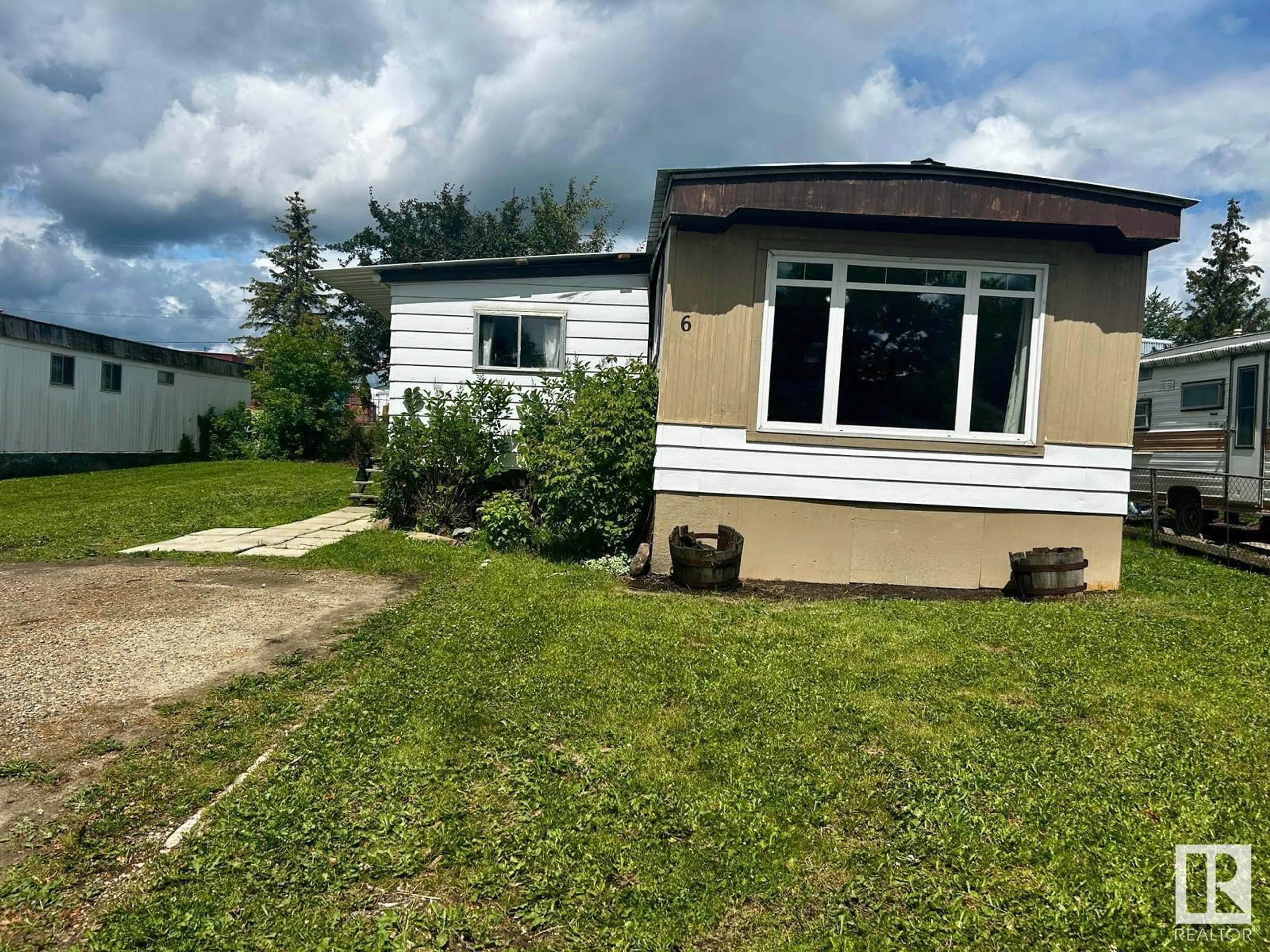A pic from outside/outdoor area/front of a property/back of a property/a pic from drone, street for 5424 48A AVE, Drayton Valley Alberta T7A1J8