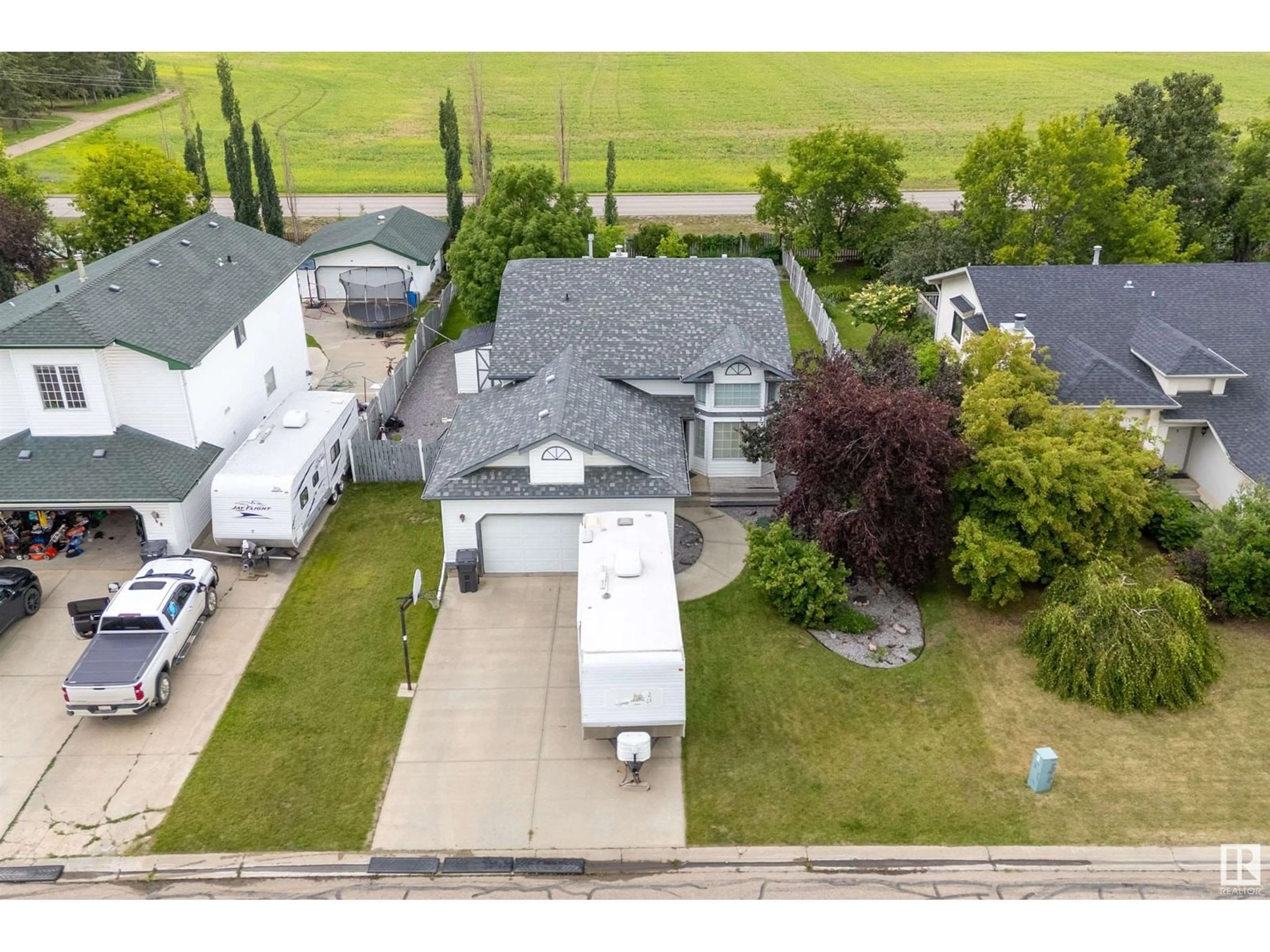 A pic from outside/outdoor area/front of a property/back of a property/a pic from drone, street for 46 ECHO AV, Cardiff Alberta T8R1P3