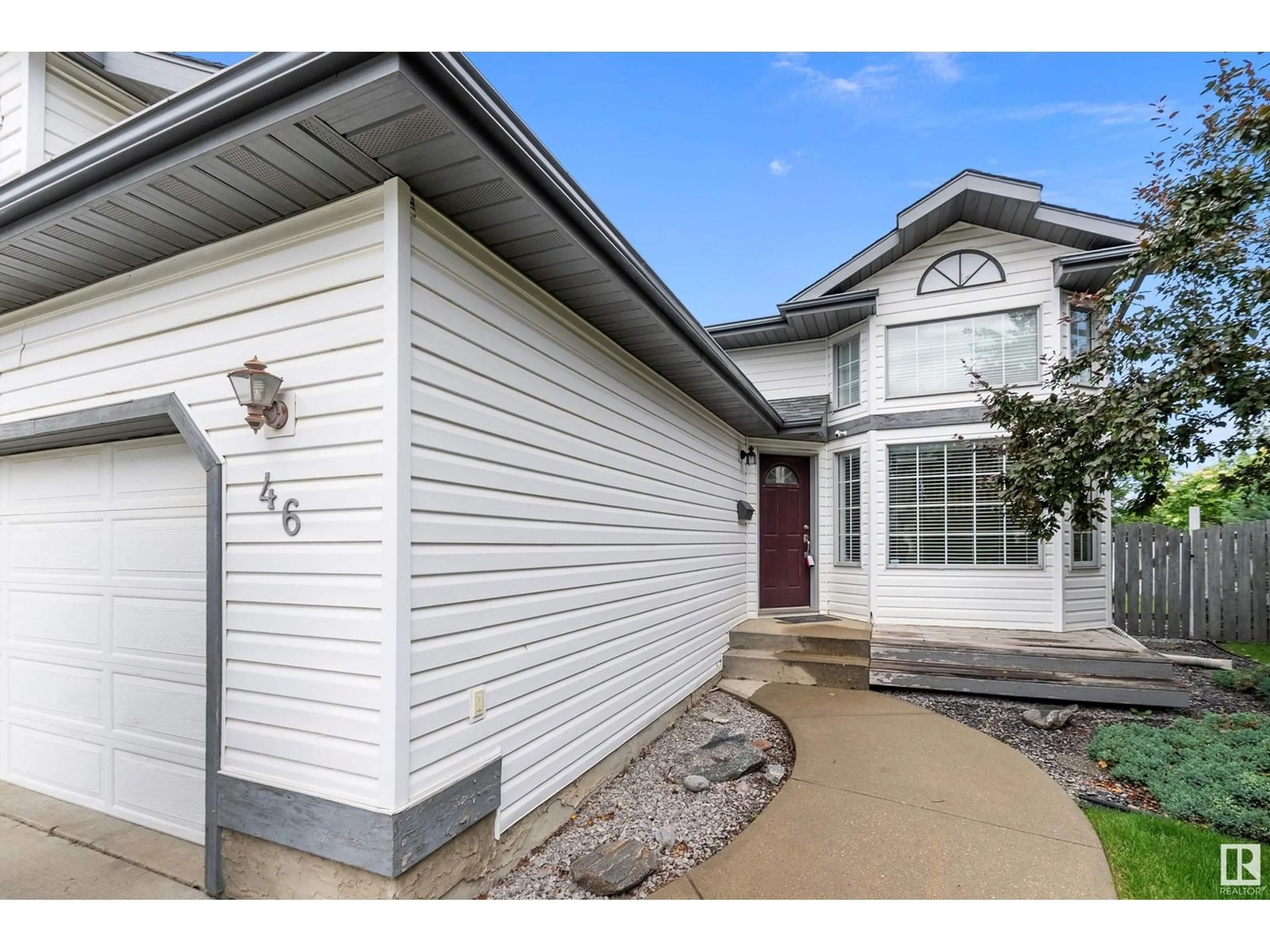 Home with vinyl exterior material, street for 46 ECHO AV, Cardiff Alberta T8R1P3