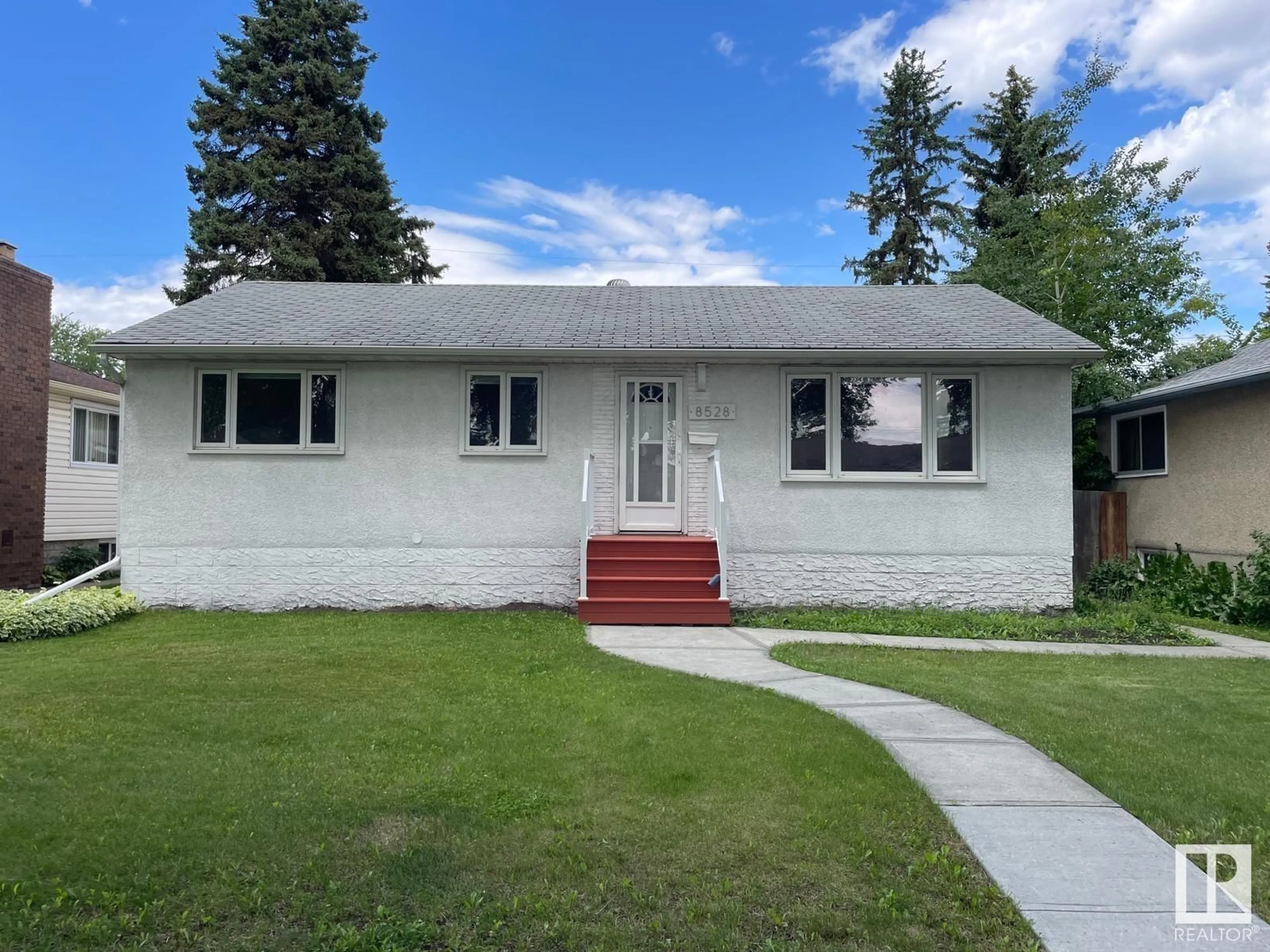Home with vinyl exterior material, street for 8528 64 AV, Edmonton Alberta T6E0H3