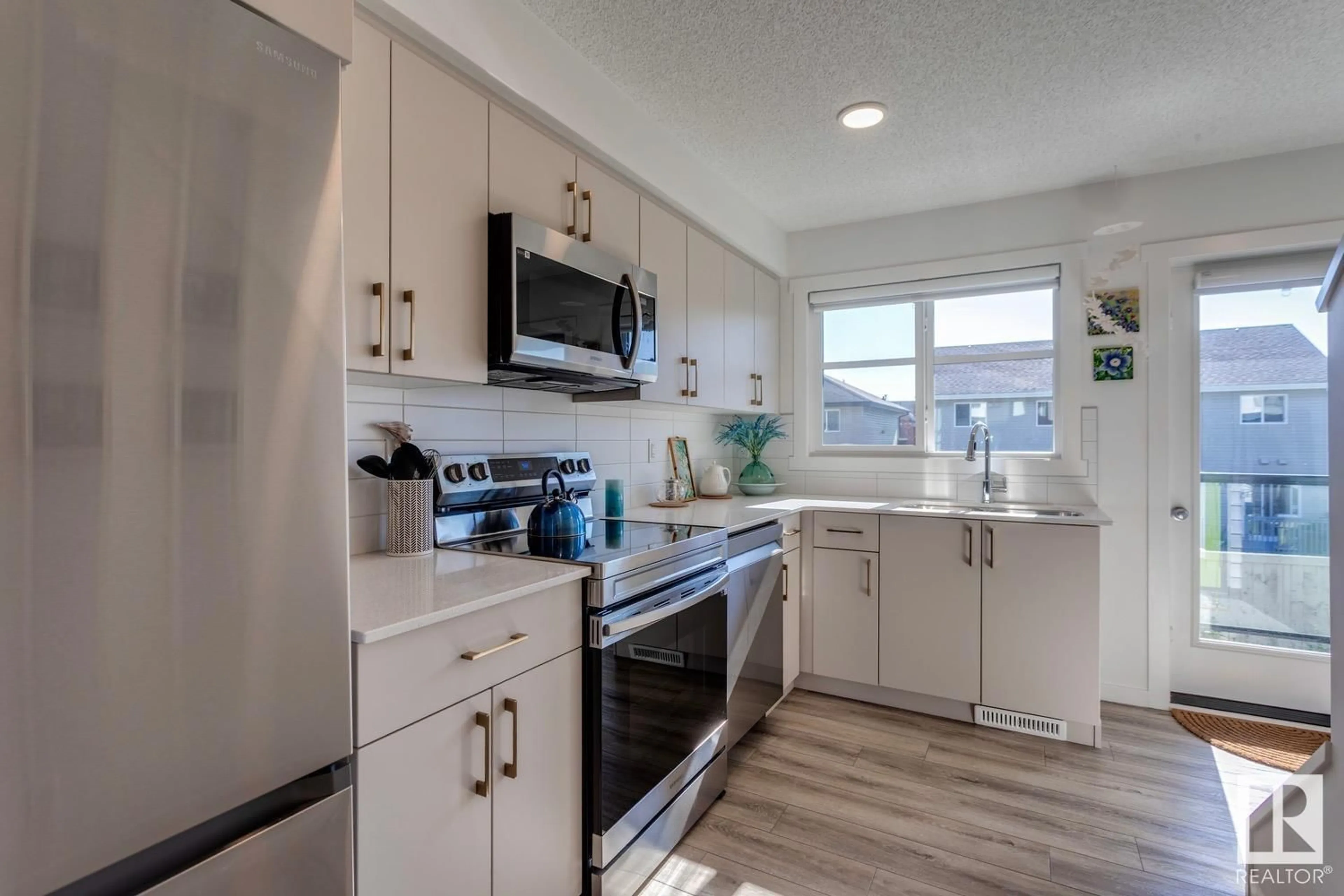 Open concept kitchen, ceramic/tile floor for #31 - 1203 163 ST, Edmonton Alberta T6W3X1