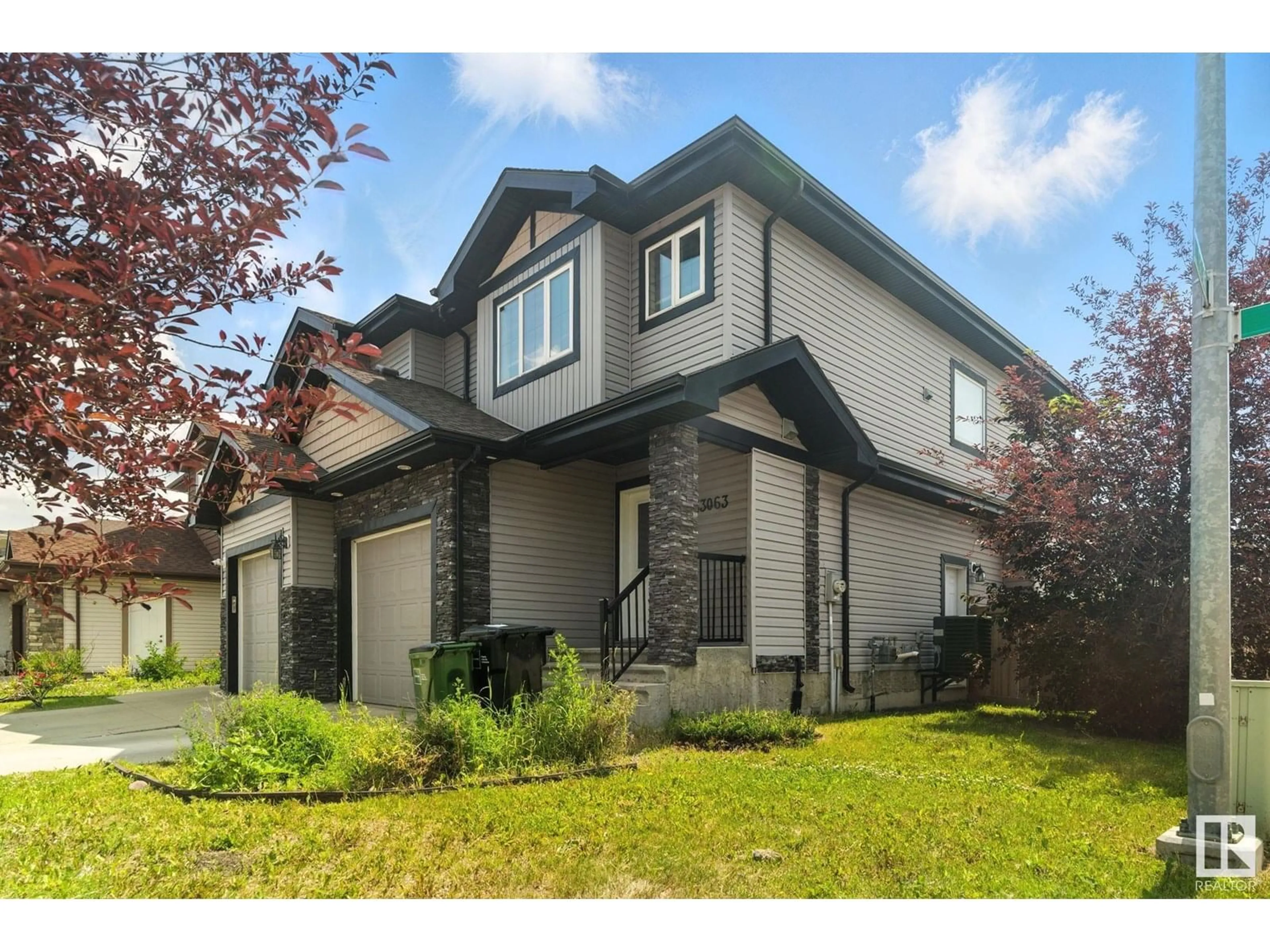 Home with vinyl exterior material, street for NW - 13063 165 AV, Edmonton Alberta T6V0G1
