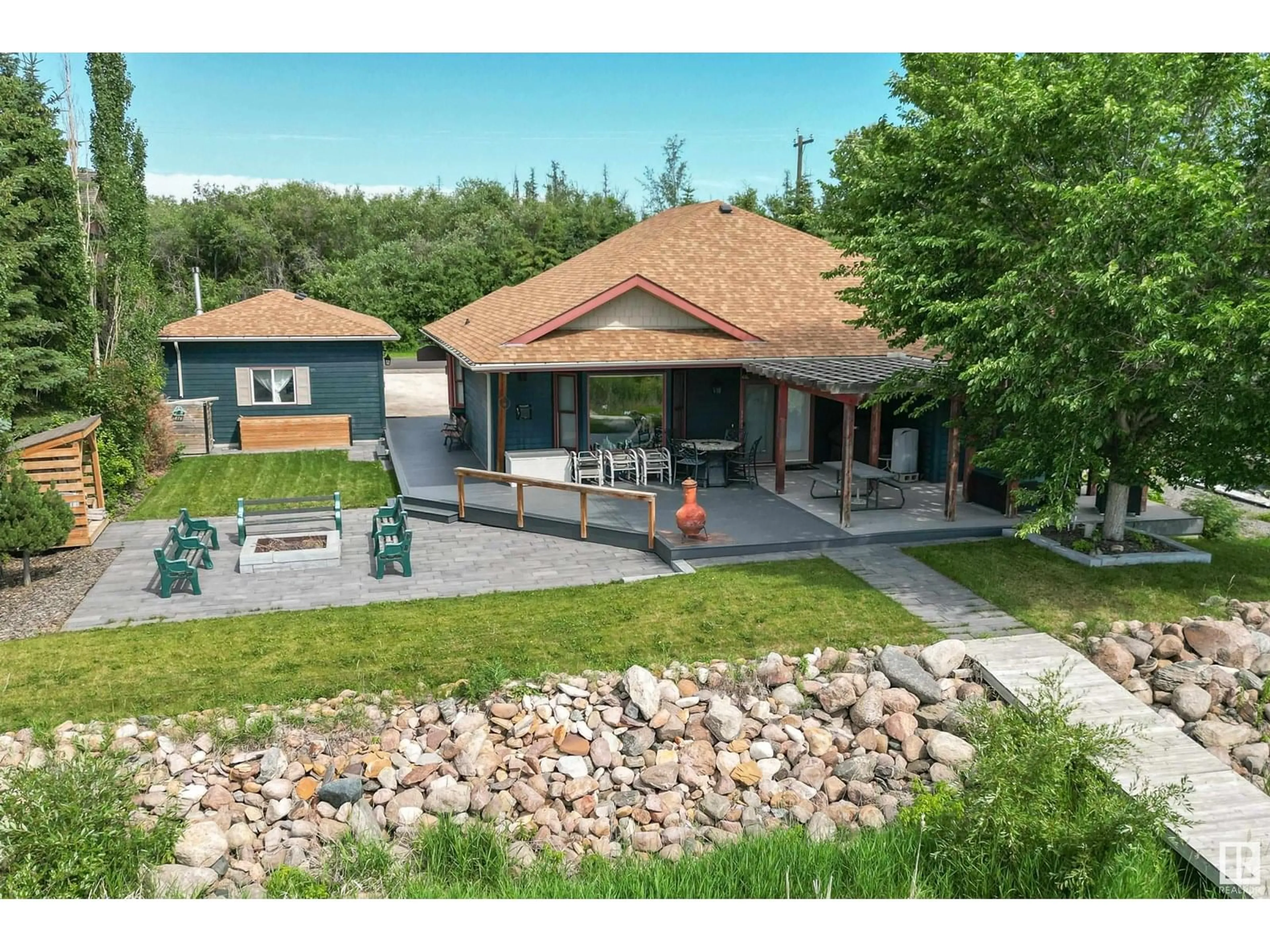 A pic from outside/outdoor area/front of a property/back of a property/a pic from drone, unknown for 103 ARGENTIA BE, Rural Wetaskiwin County Alberta T0C2C0