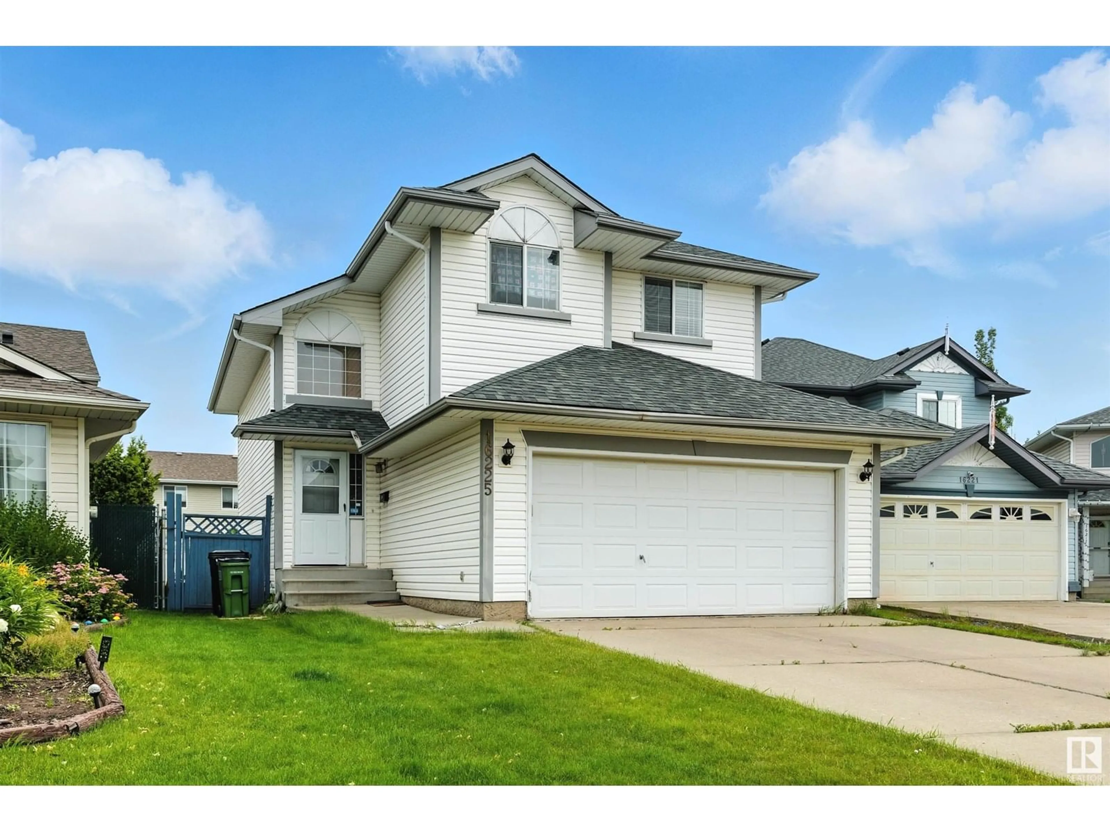 Home with vinyl exterior material, street for NW - 16225 58 ST, Edmonton Alberta T5Y2W2