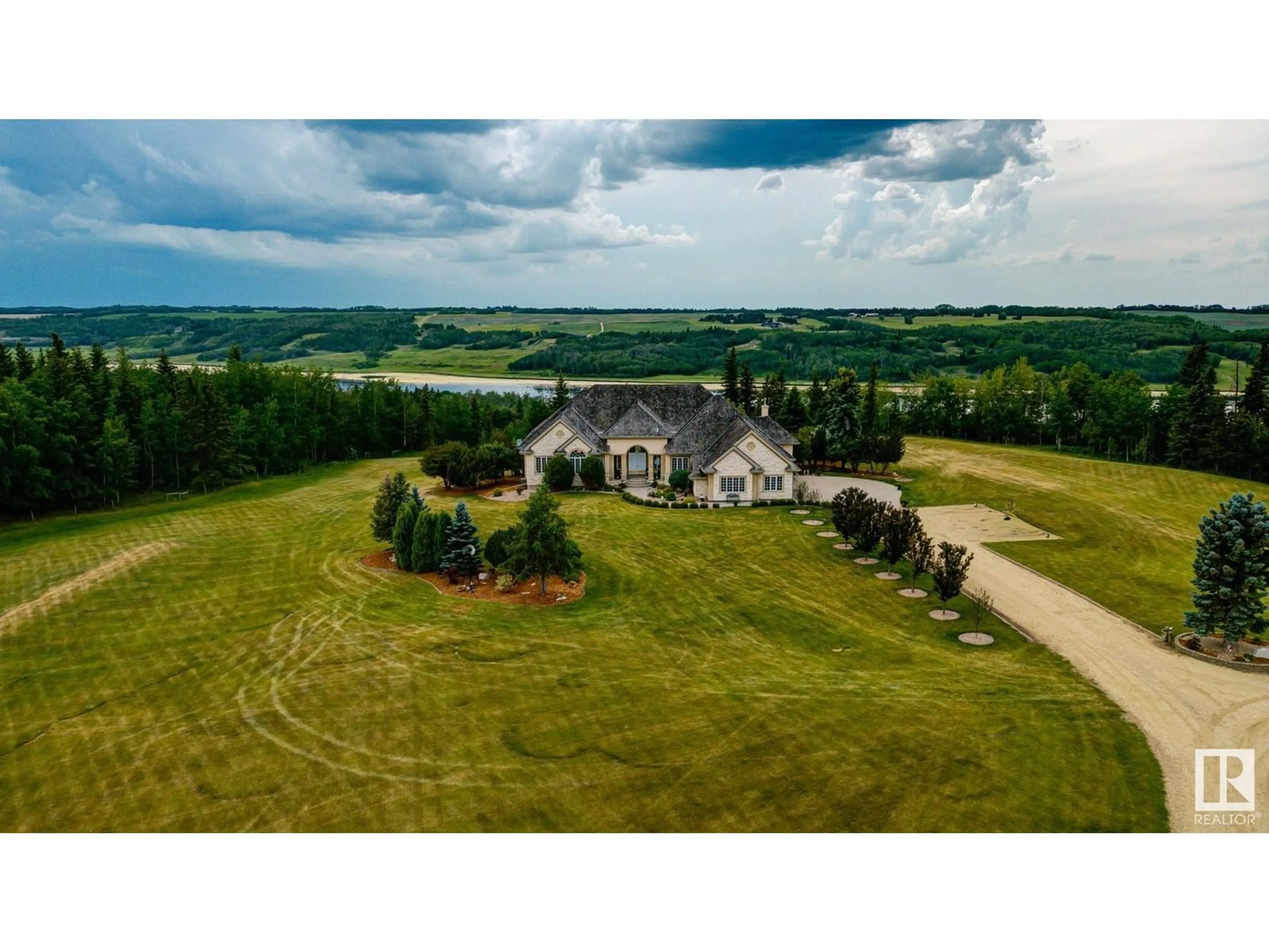 A pic from outside/outdoor area/front of a property/back of a property/a pic from drone, unknown for 23362 TWP ROAD 490, Rural Leduc County Alberta T4X1X2