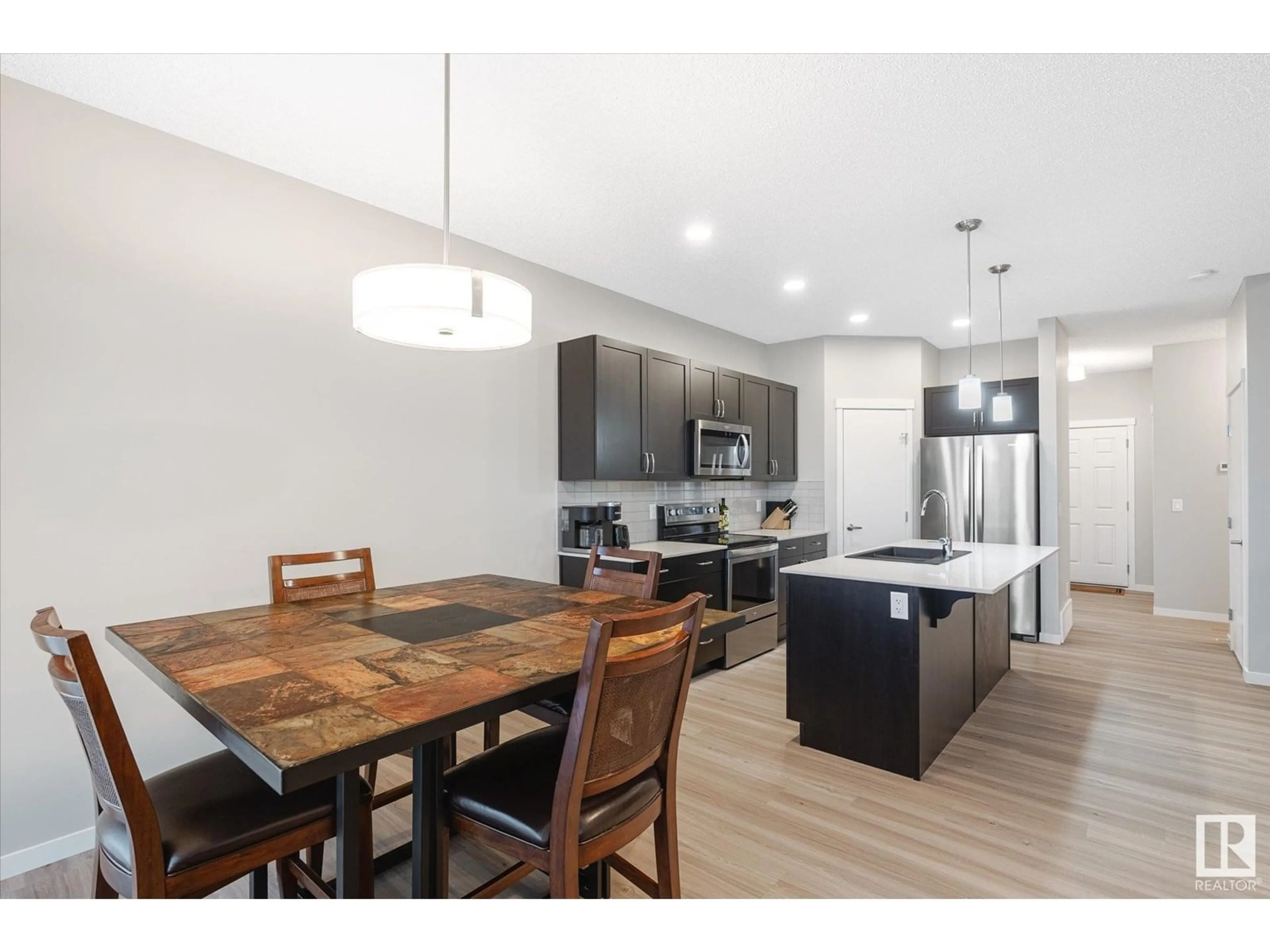 Open concept kitchen, wood/laminate floor for 2056 WESTERRA LO, Stony Plain Alberta T7Z0M9