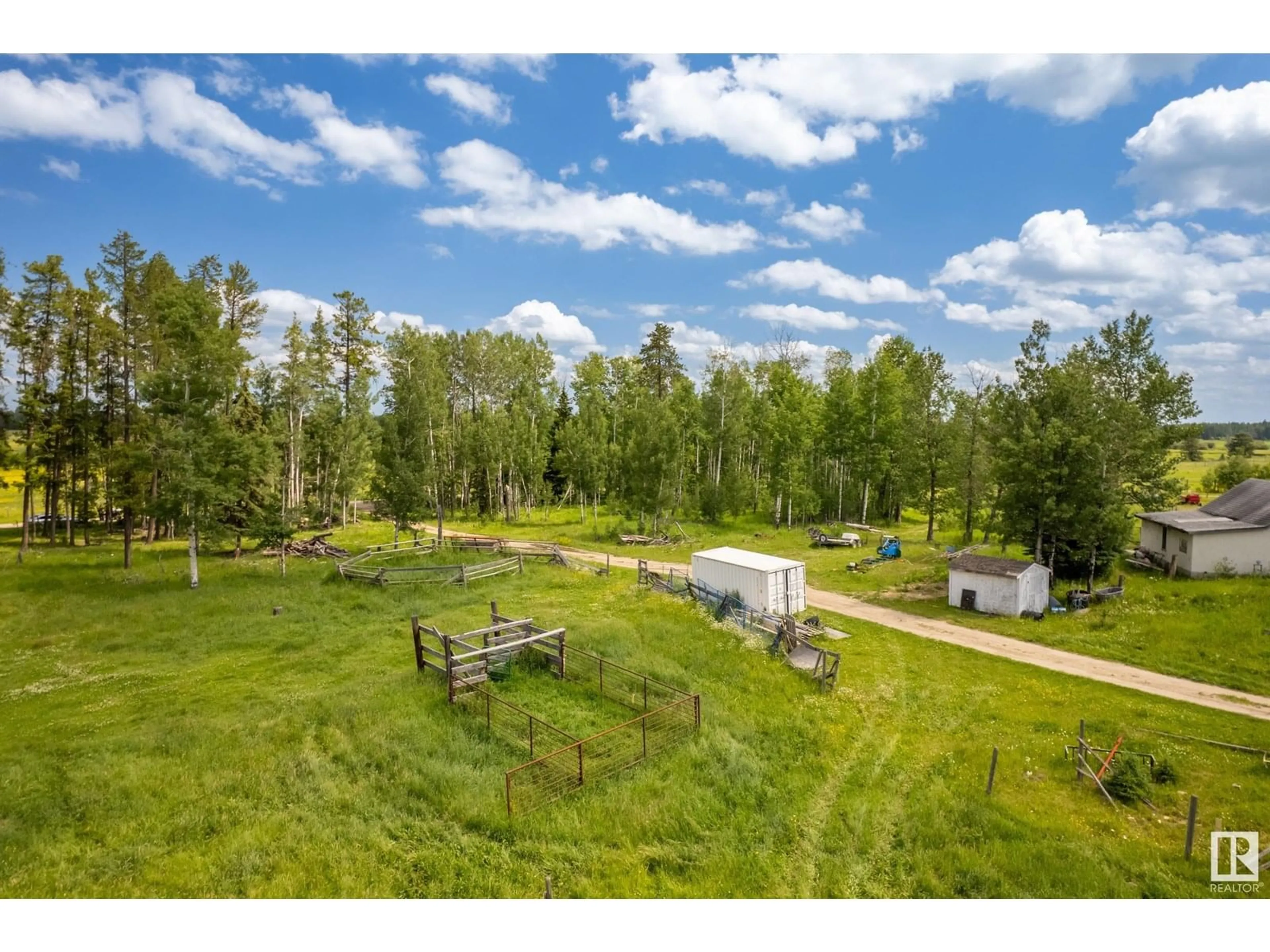 A pic from outside/outdoor area/front of a property/back of a property/a pic from drone, forest/trees view for 11517 TWP RD 541 A, Rural Yellowhead Alberta T0E1S0