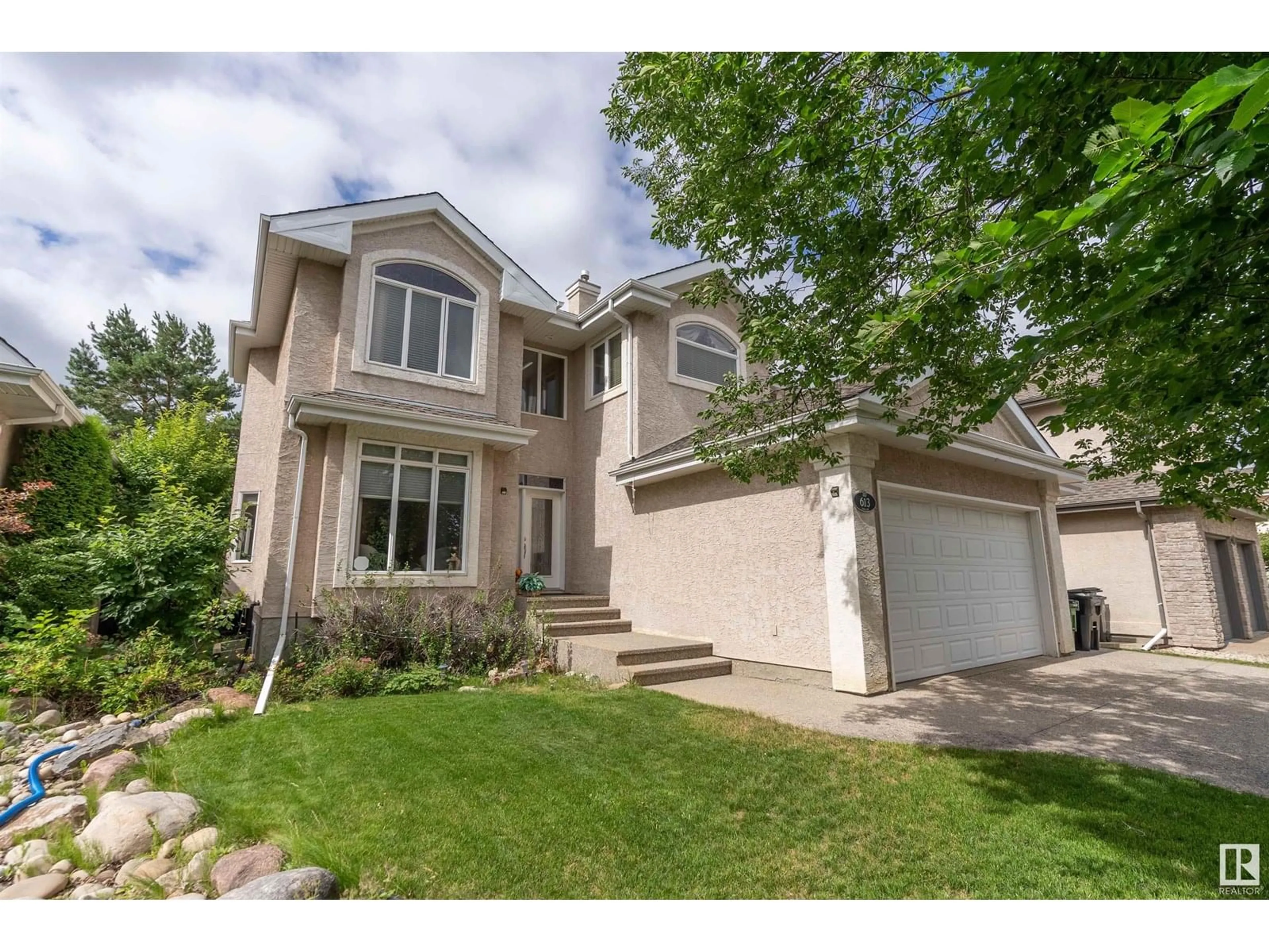 Home with vinyl exterior material, street for NW - 613 TODD LINK LI, Edmonton Alberta T6R3C4