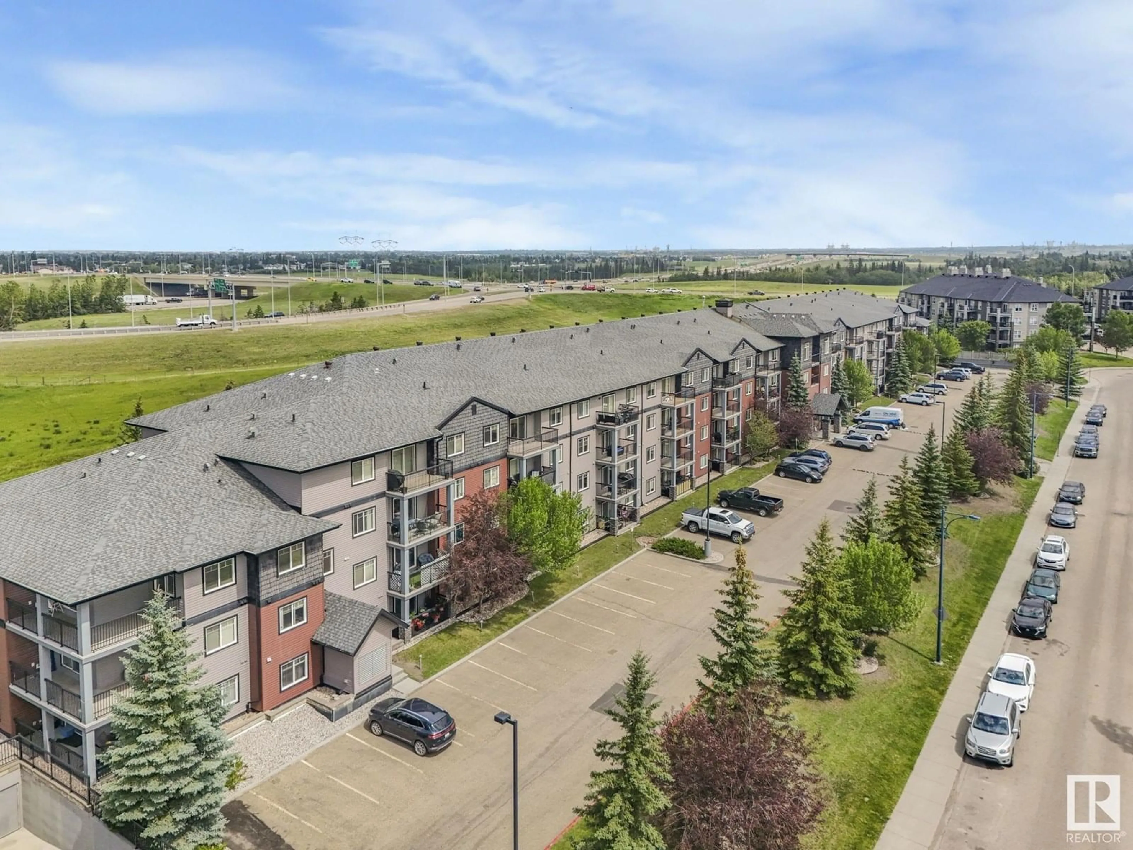 A pic from outside/outdoor area/front of a property/back of a property/a pic from drone, city buildings view from balcony for #209 - 646 MCALLISTER LO, Edmonton Alberta T6W0B5