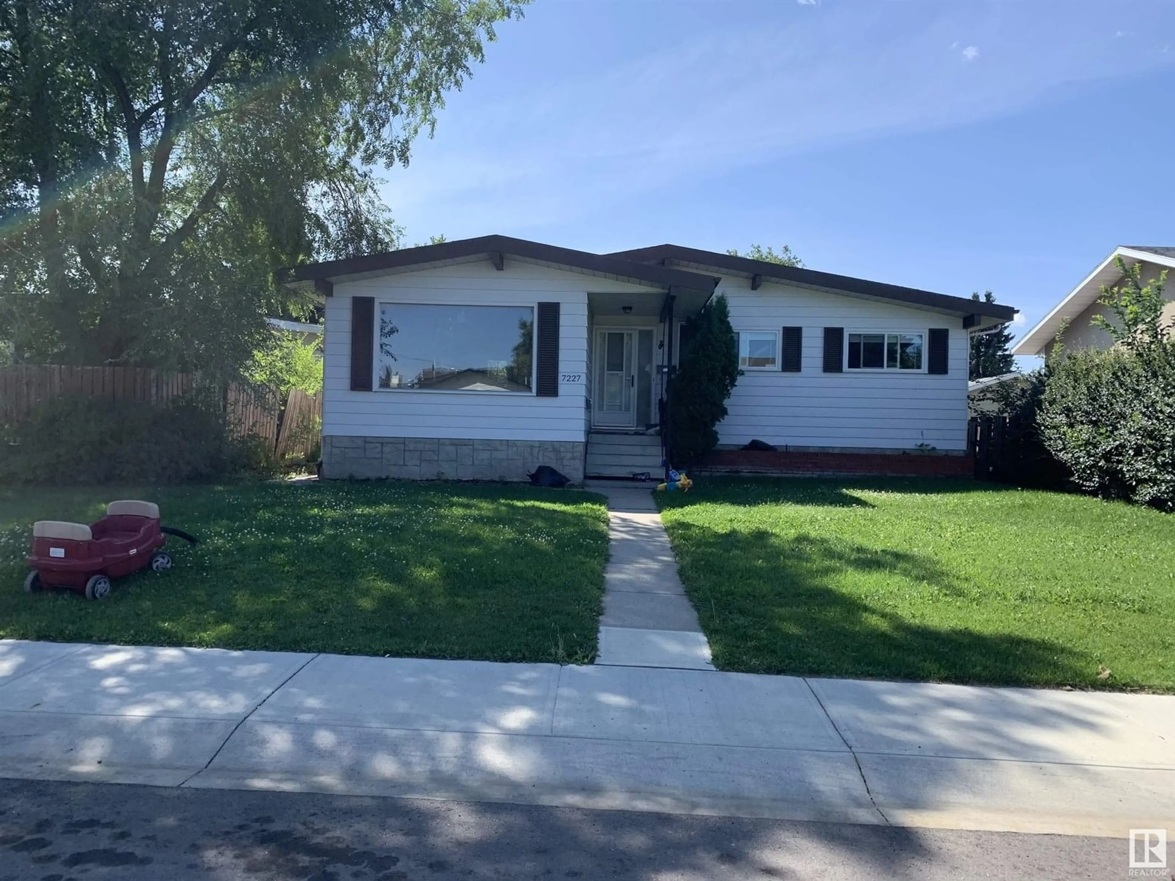 Home with vinyl exterior material, street for 7227 152A AV, Edmonton Alberta T5C2Z3