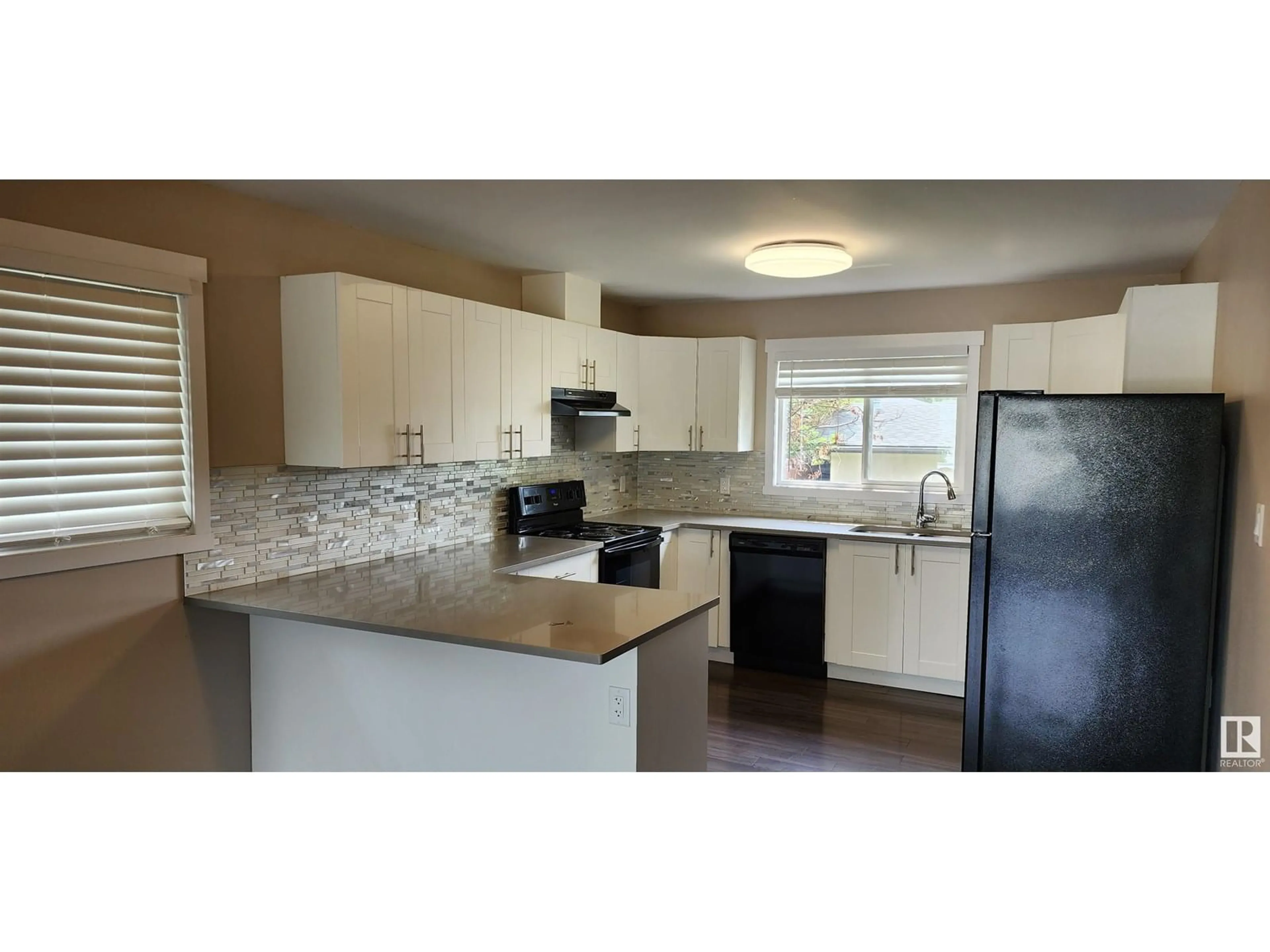 Open concept kitchen, ceramic/tile floor for 7227 152A AV, Edmonton Alberta T5C2Z3