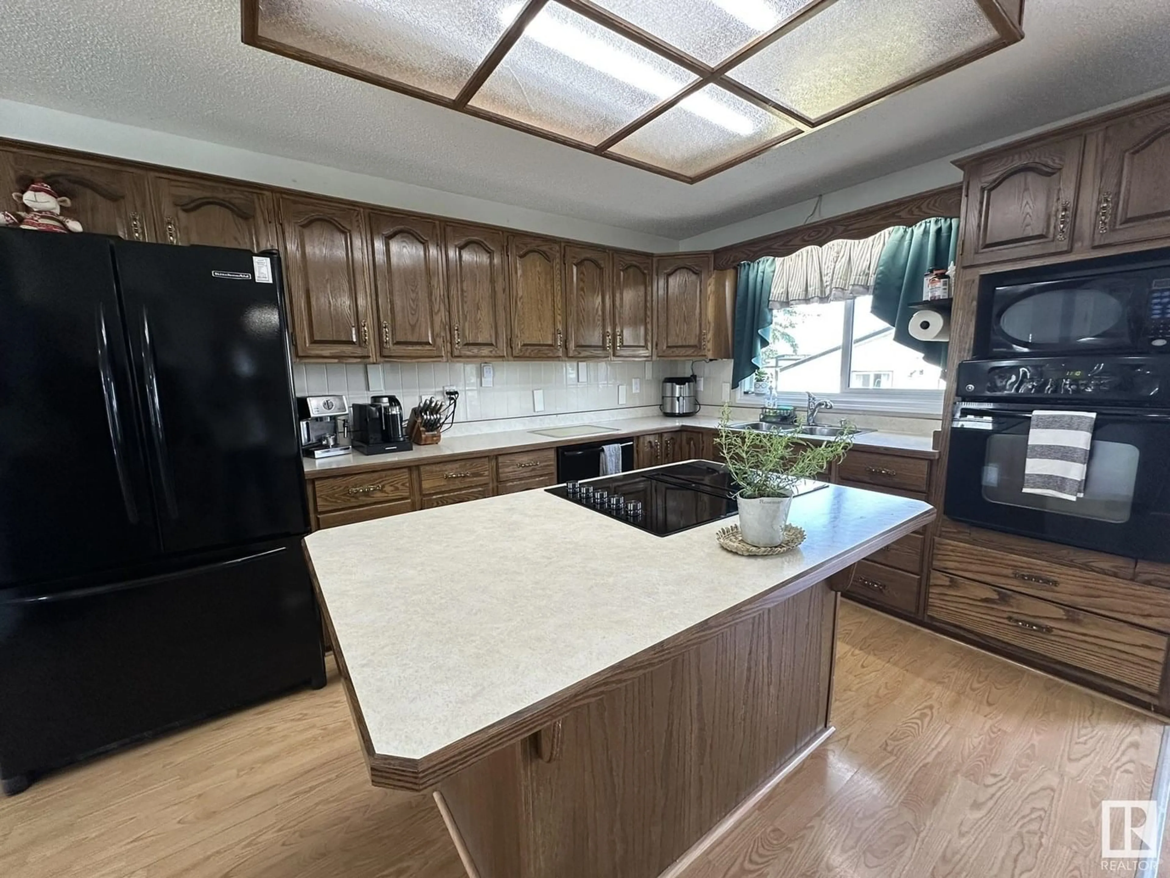 Open concept kitchen, unknown for 5210 54 AV, Andrew Alberta T0C0C0