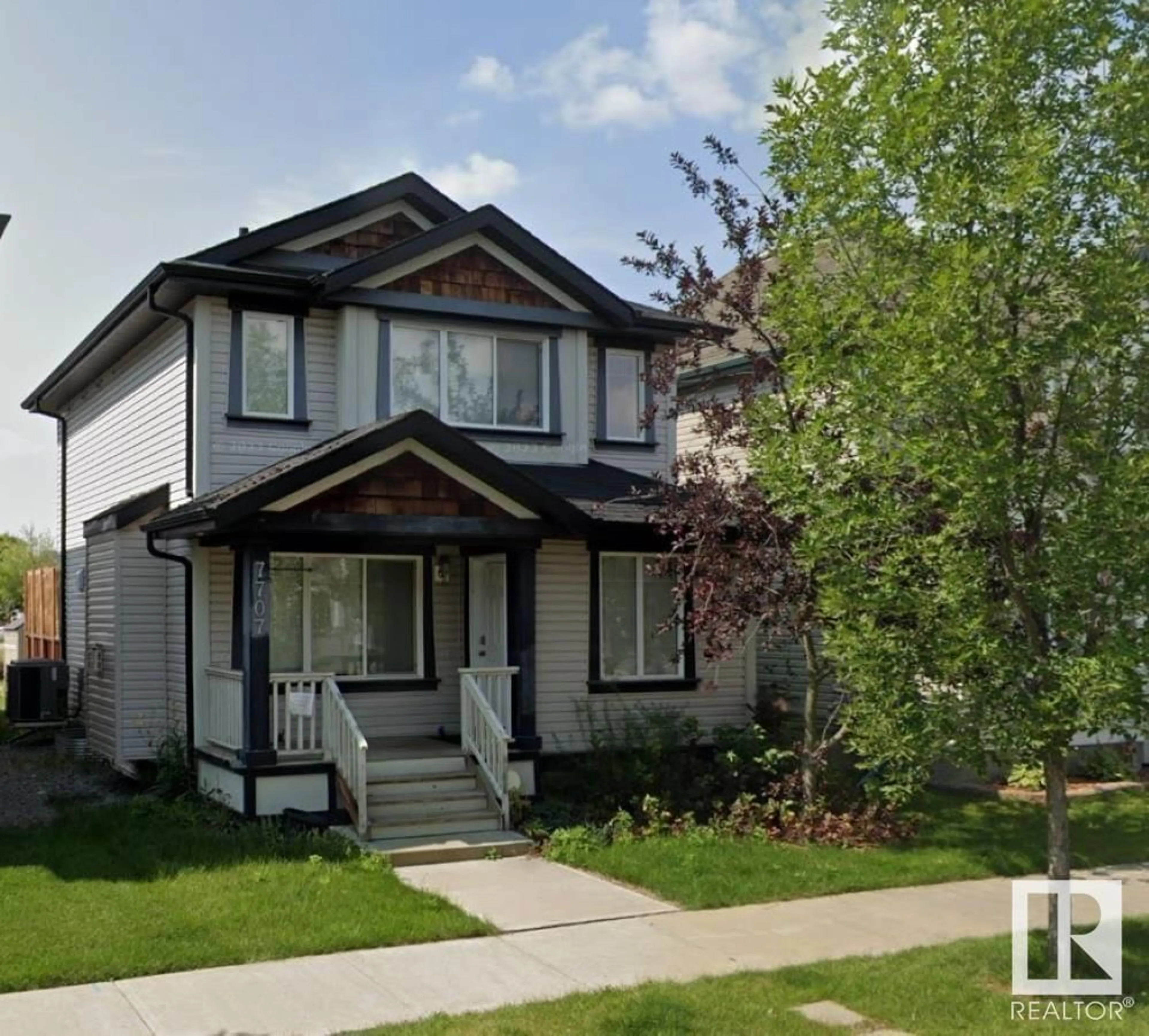 Home with vinyl exterior material, street for 7707 SCHMID CR, Edmonton Alberta T6R0K6