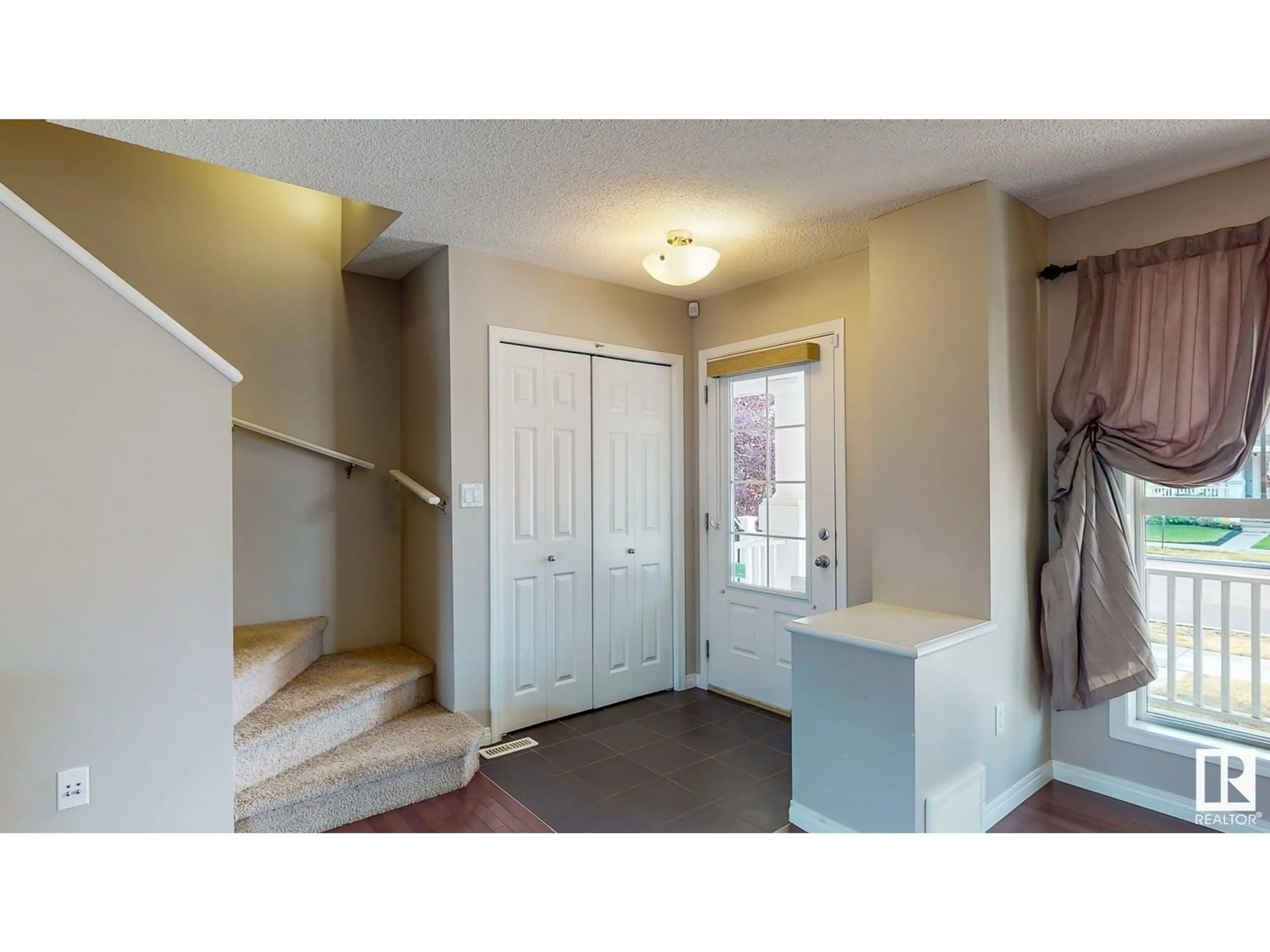 Indoor entryway for 7306 22 AV, Edmonton Alberta T6X0V6