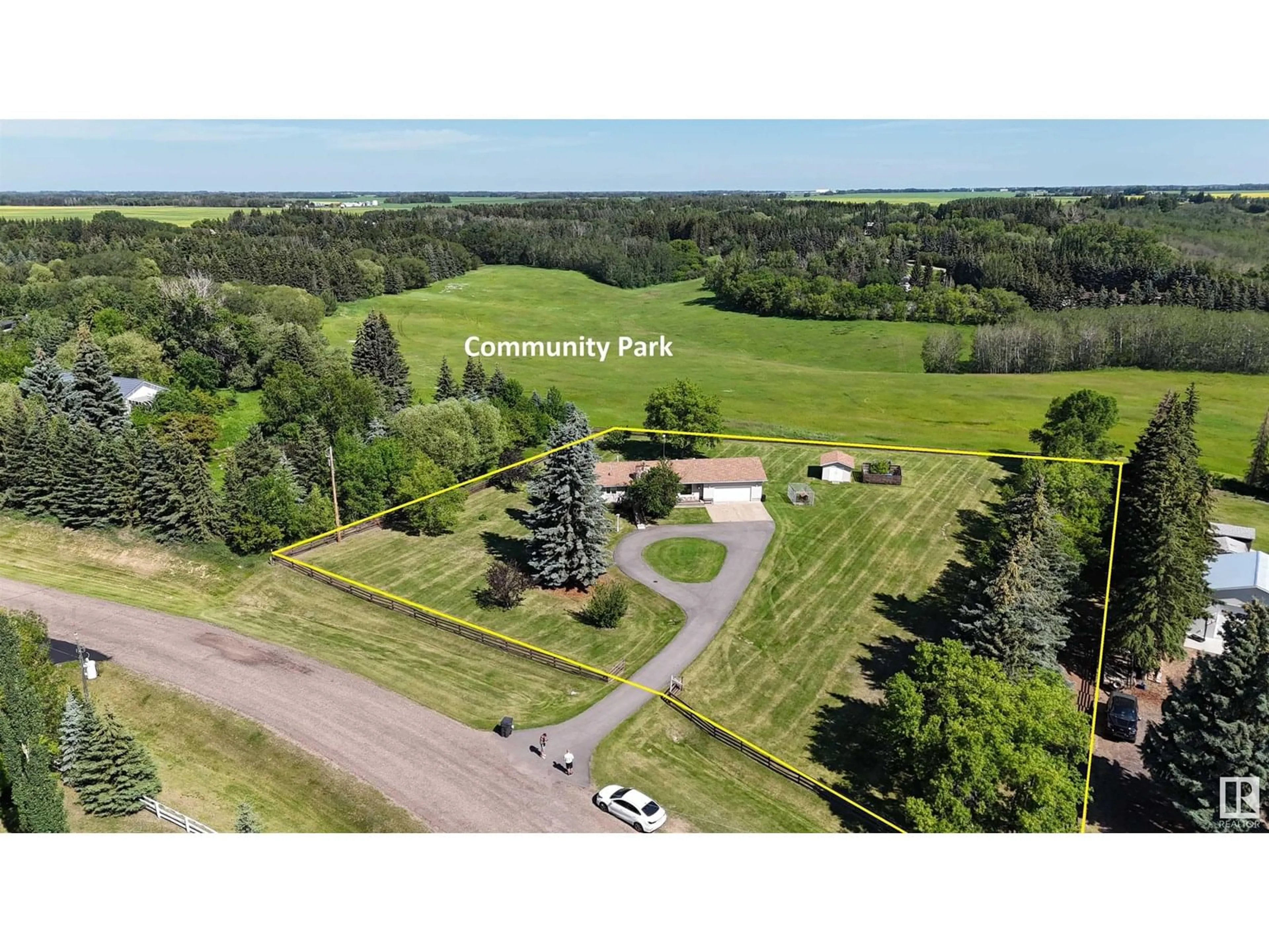 A pic from outside/outdoor area/front of a property/back of a property/a pic from drone, forest/trees view for 61 24213 TWP ROAD ROAD, Rural Sturgeon County Alberta T8T1X9