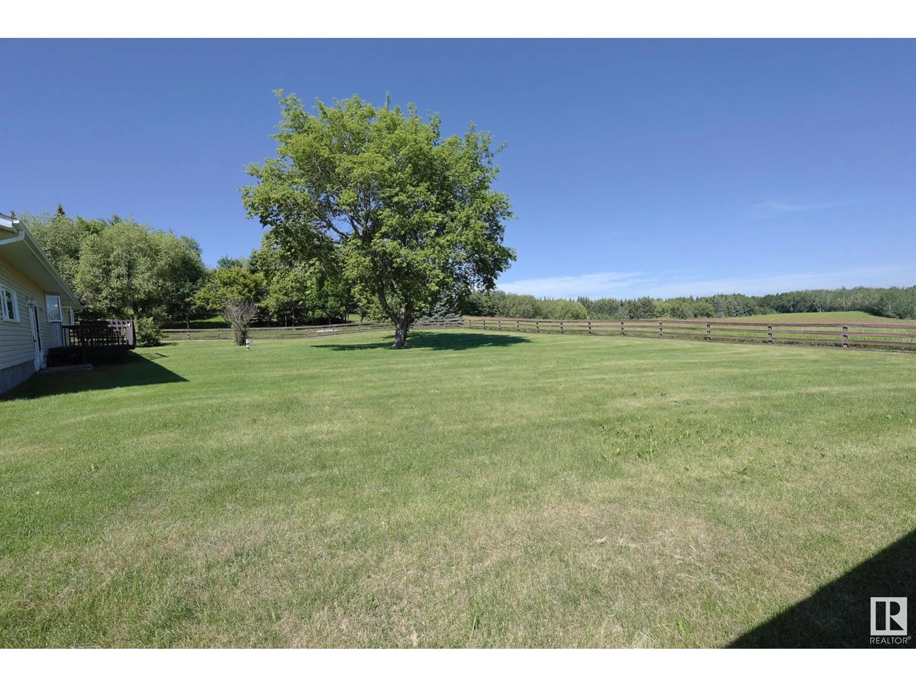 A pic from outside/outdoor area/front of a property/back of a property/a pic from drone, water/lake/river/ocean view for 61 24213 TWP ROAD ROAD, Rural Sturgeon County Alberta T8T1X9