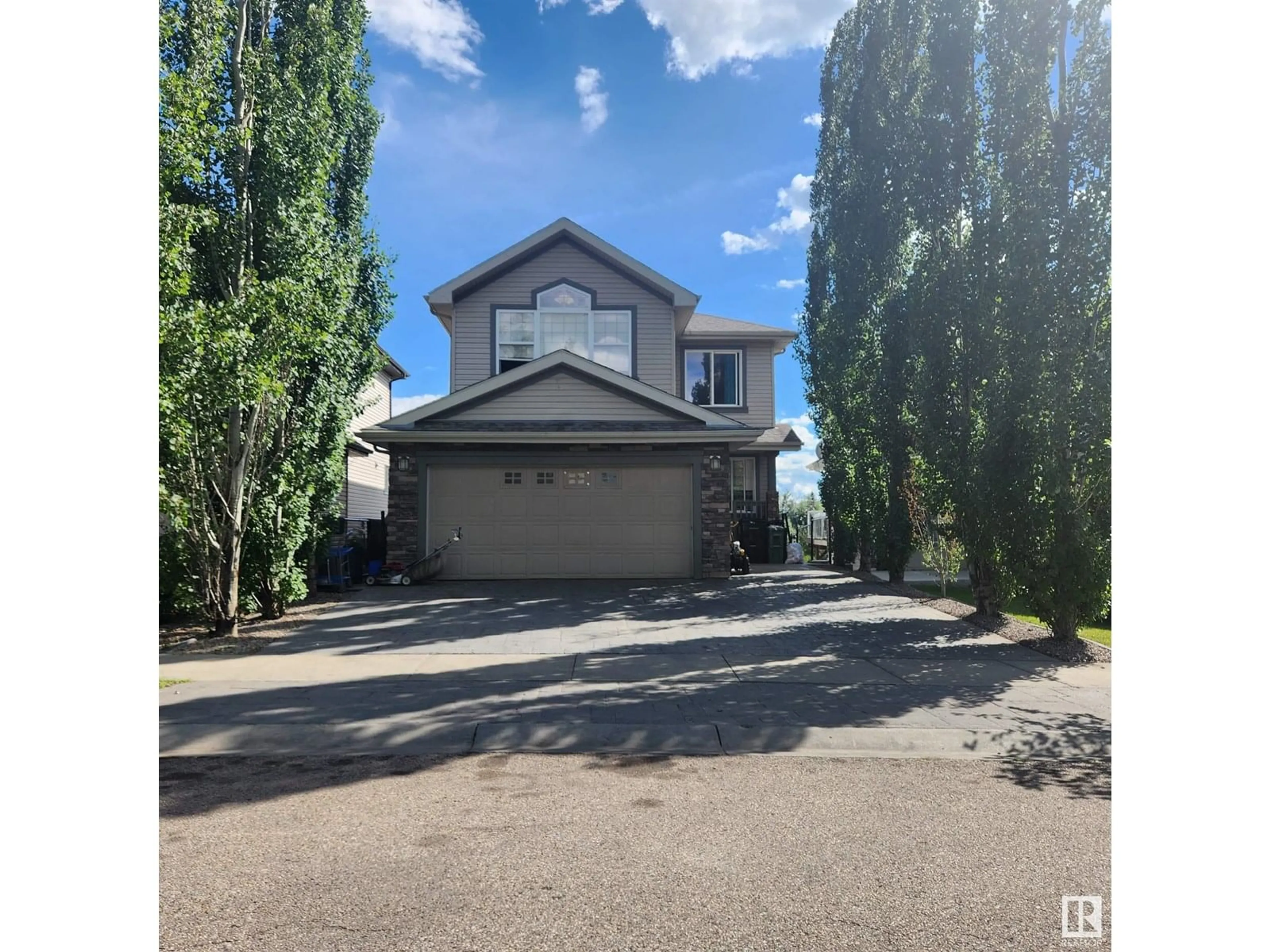 Home with vinyl exterior material, street for SW - 6231 4 AV, Edmonton Alberta T6X0C2