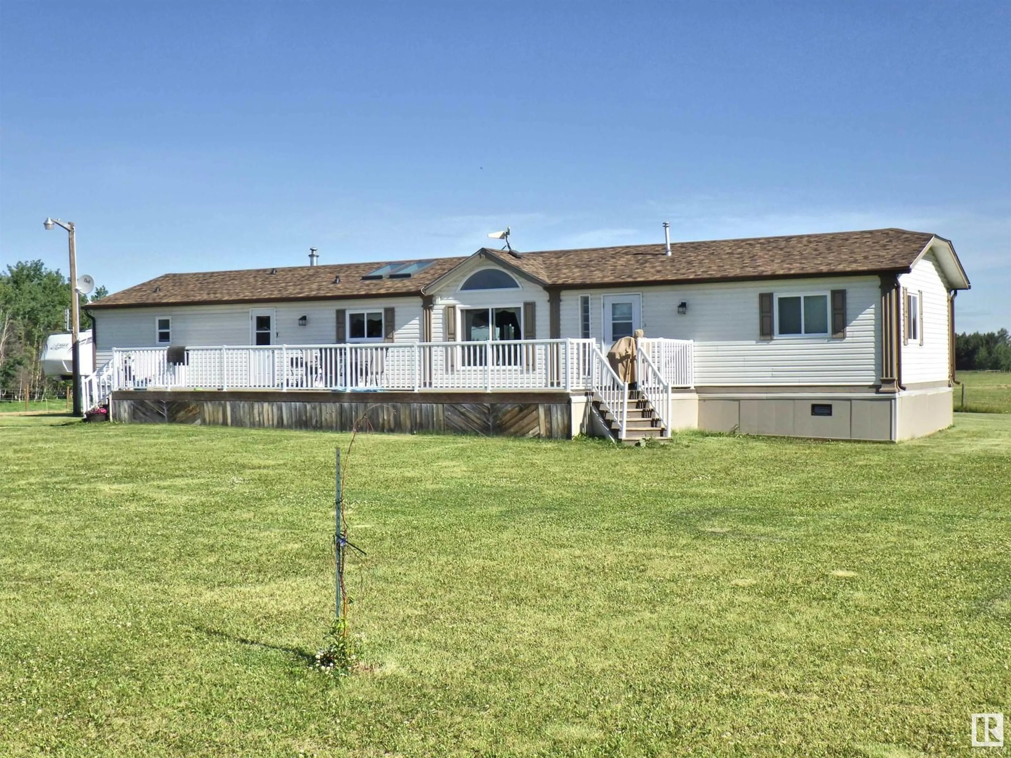 A pic from outside/outdoor area/front of a property/back of a property/a pic from drone, unknown for 2310 TWP ROAD 554, Rural Lac Ste. Anne County Alberta T0E1V0