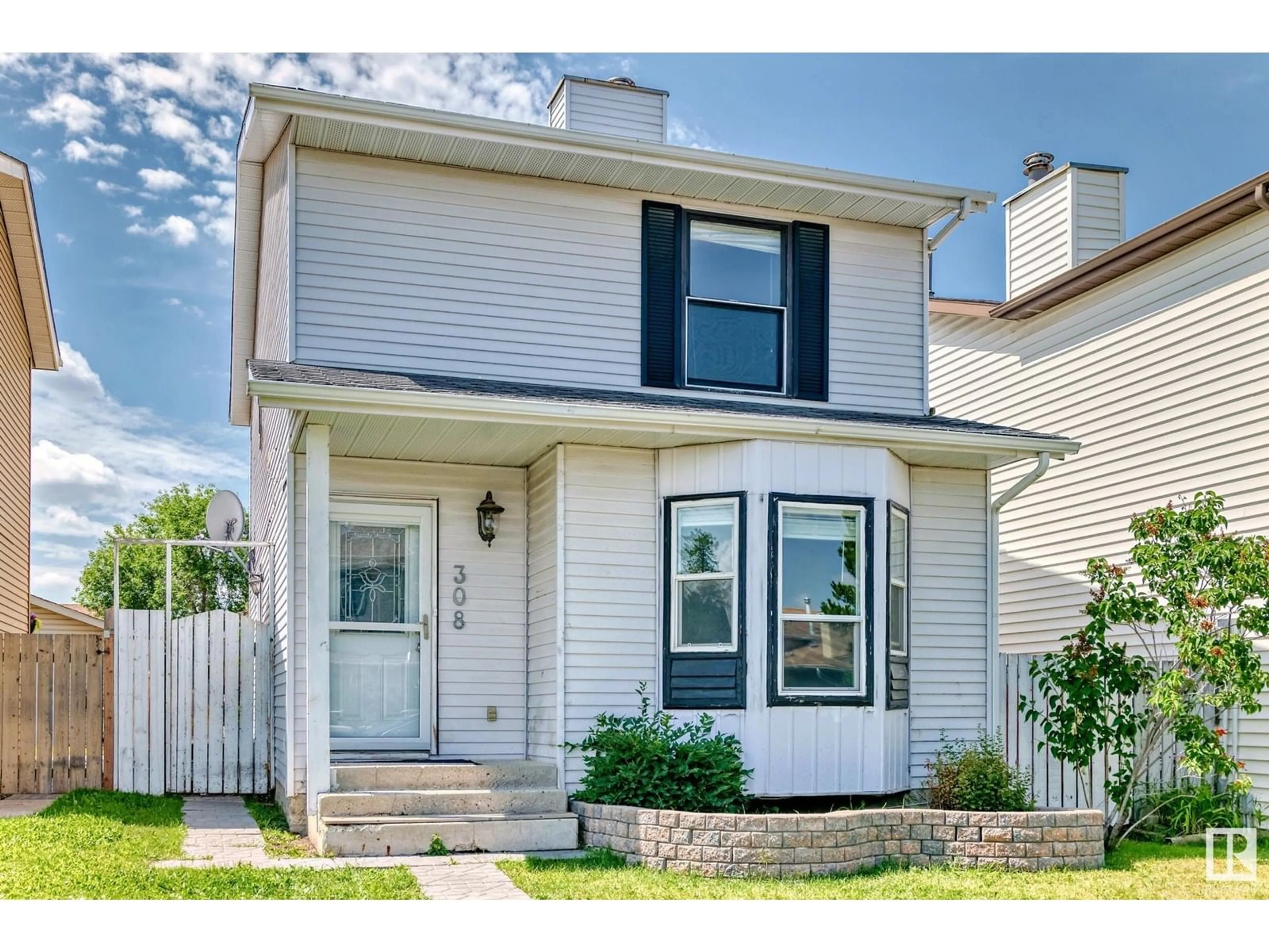 Home with vinyl exterior material, street for 308 KIRKPATRICK CR, Edmonton Alberta T6L5E1