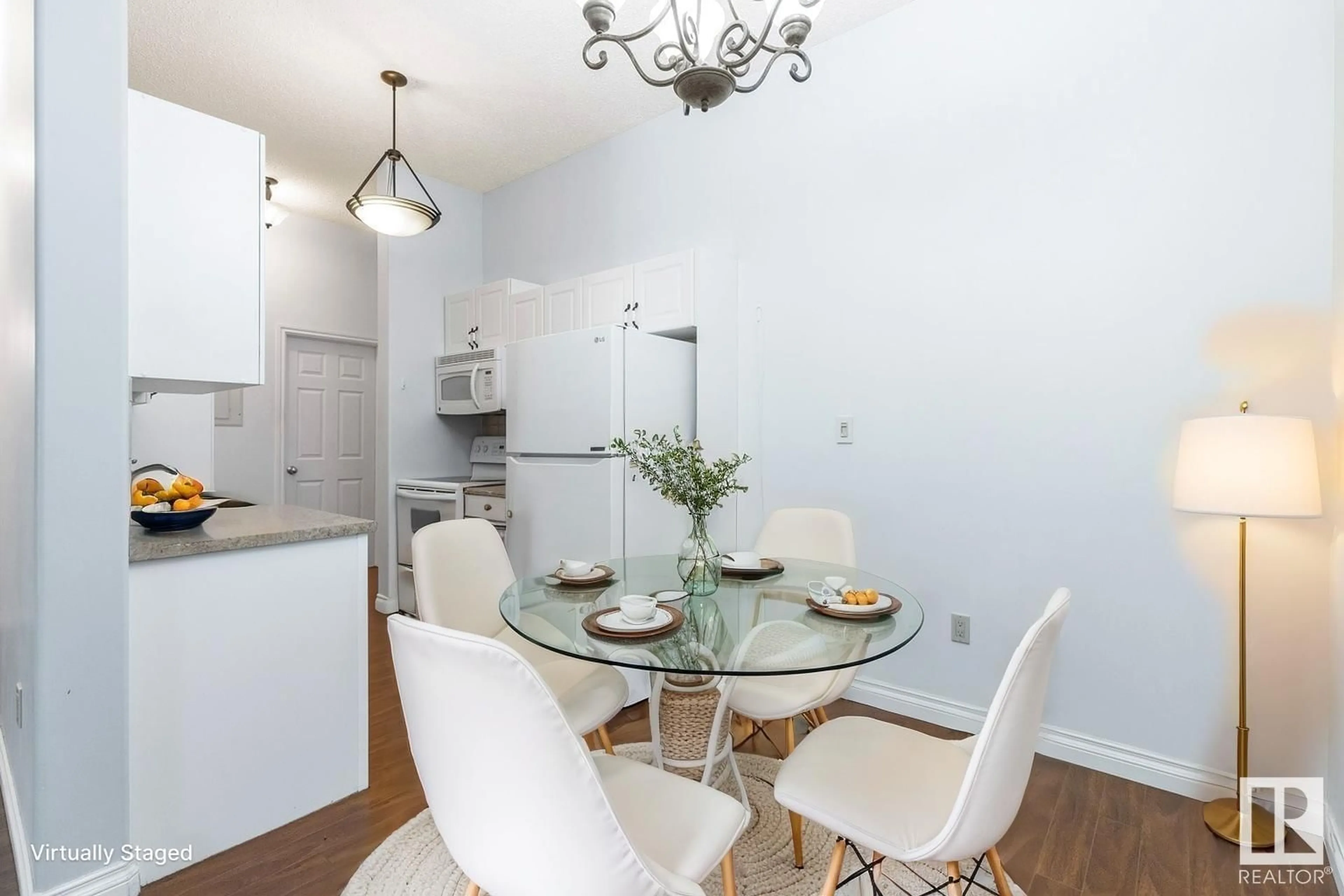 Dining room, wood/laminate floor for #104 - 11446 40 AV, Edmonton Alberta T6J0R5