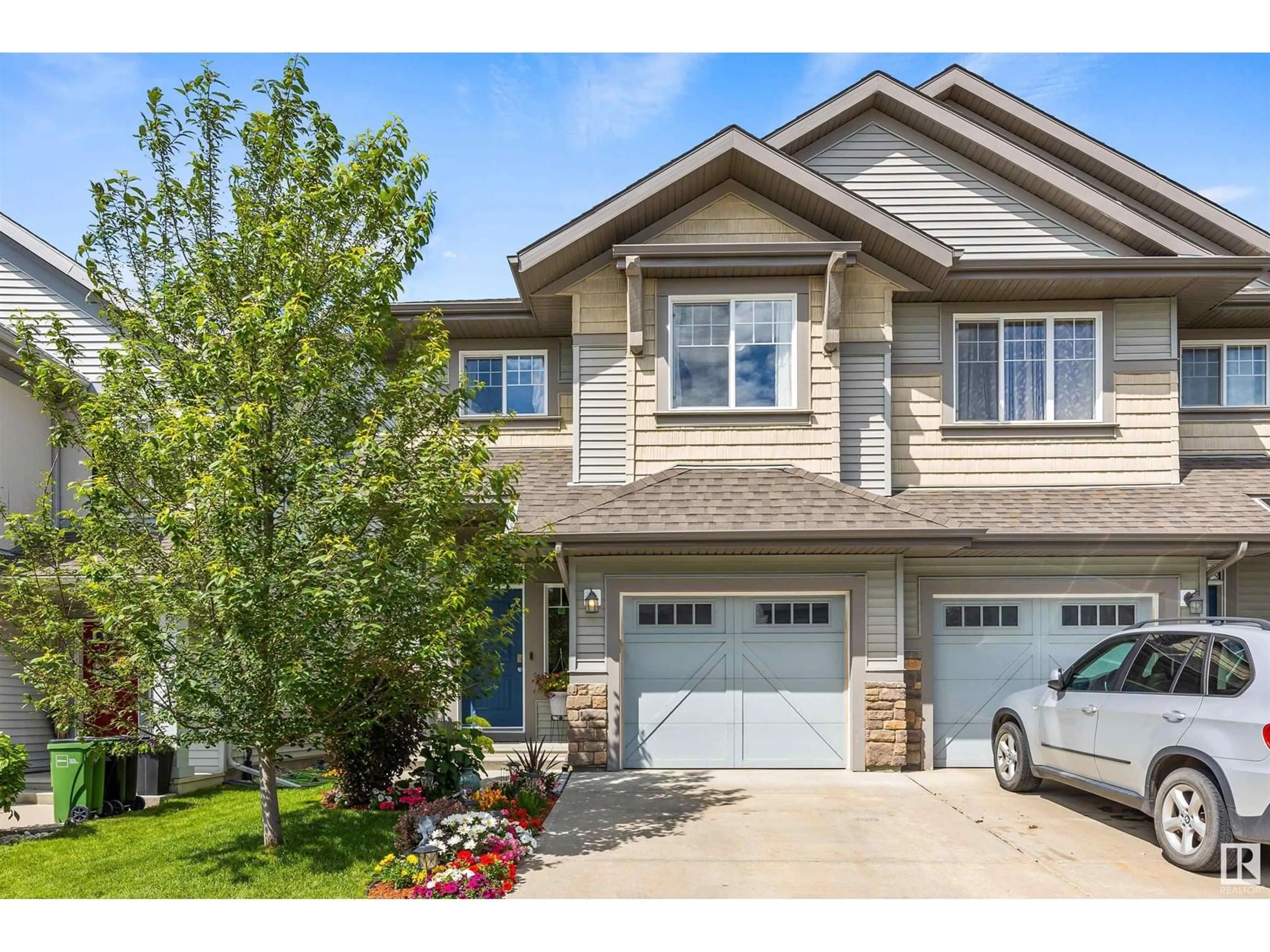 Home with vinyl exterior material, street for 771 EAGLESON CR, Edmonton Alberta T6M0V2