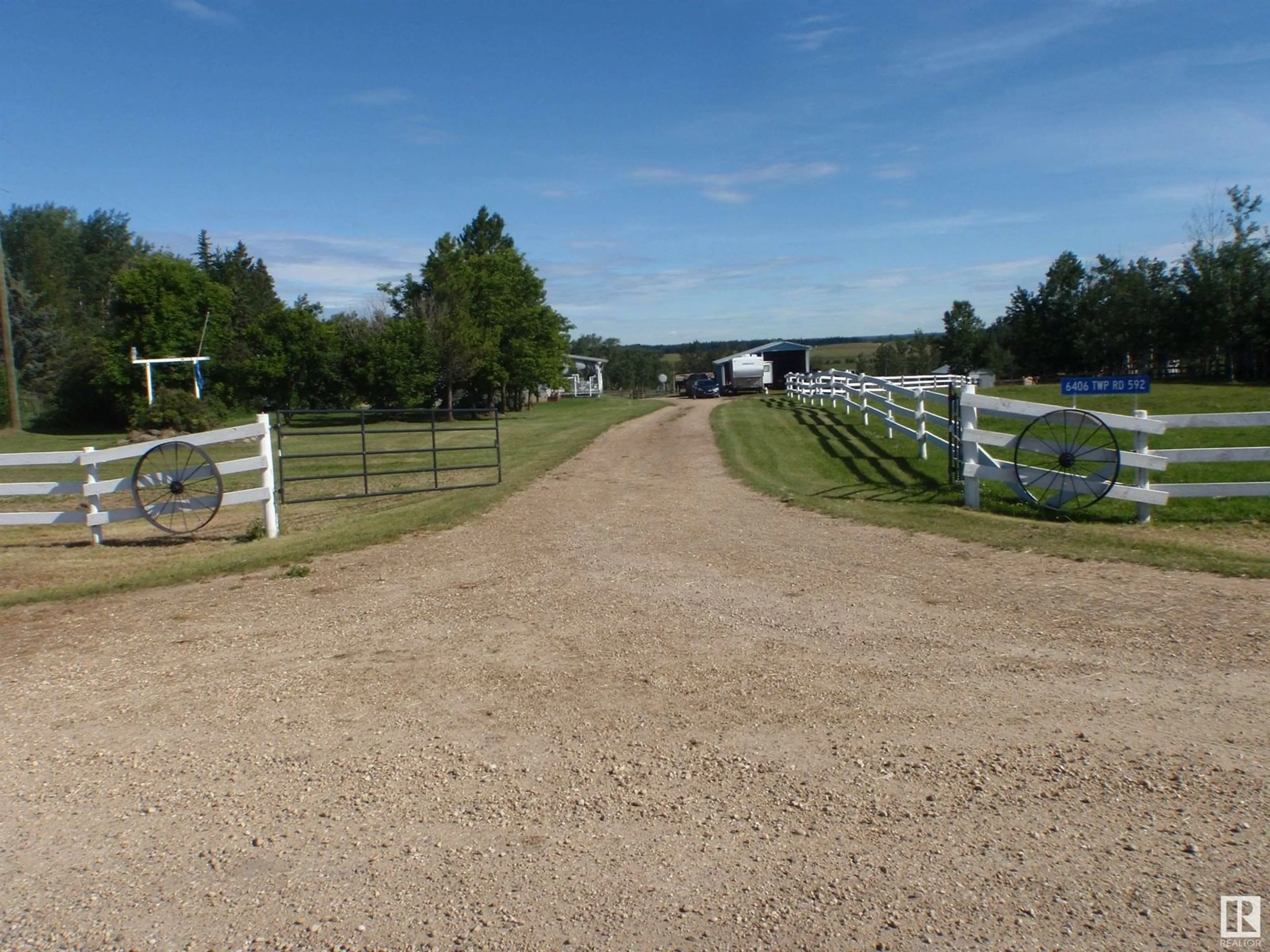A pic from outside/outdoor area/front of a property/back of a property/a pic from drone, street for 6406 TWP RD 592, Rural Lac Ste. Anne County Alberta T0E2A0