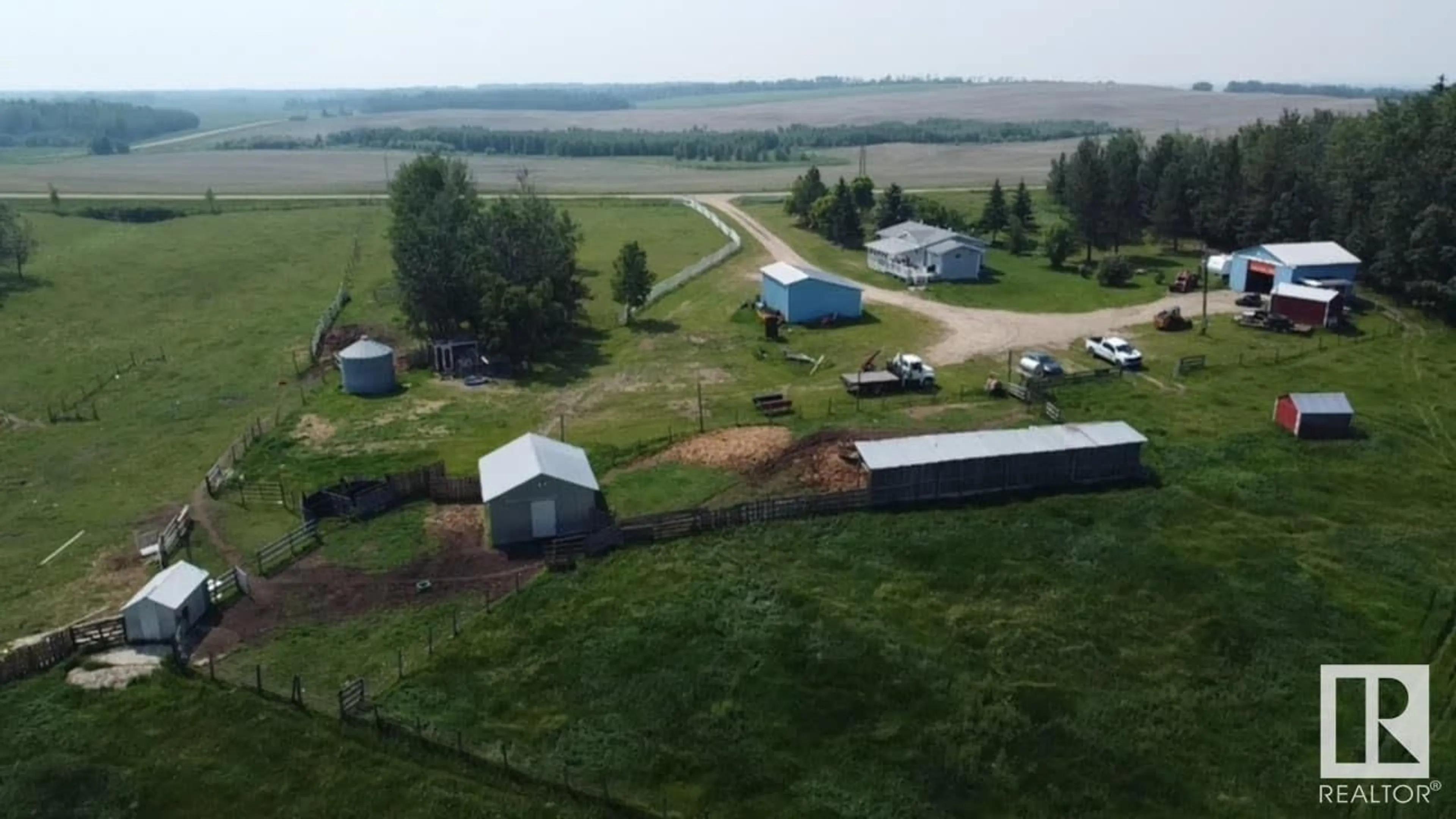 A pic from outside/outdoor area/front of a property/back of a property/a pic from drone, mountain view for 6406 TWP RD 592, Rural Lac Ste. Anne County Alberta T0E2A0