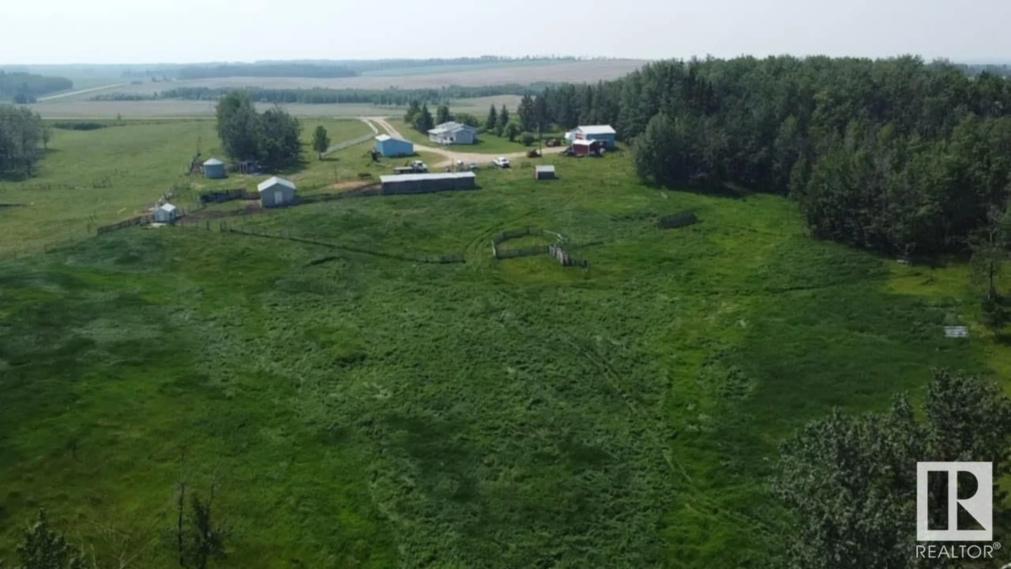 A pic from outside/outdoor area/front of a property/back of a property/a pic from drone, mountain view for 6406 TWP RD 592, Rural Lac Ste. Anne County Alberta T0E2A0