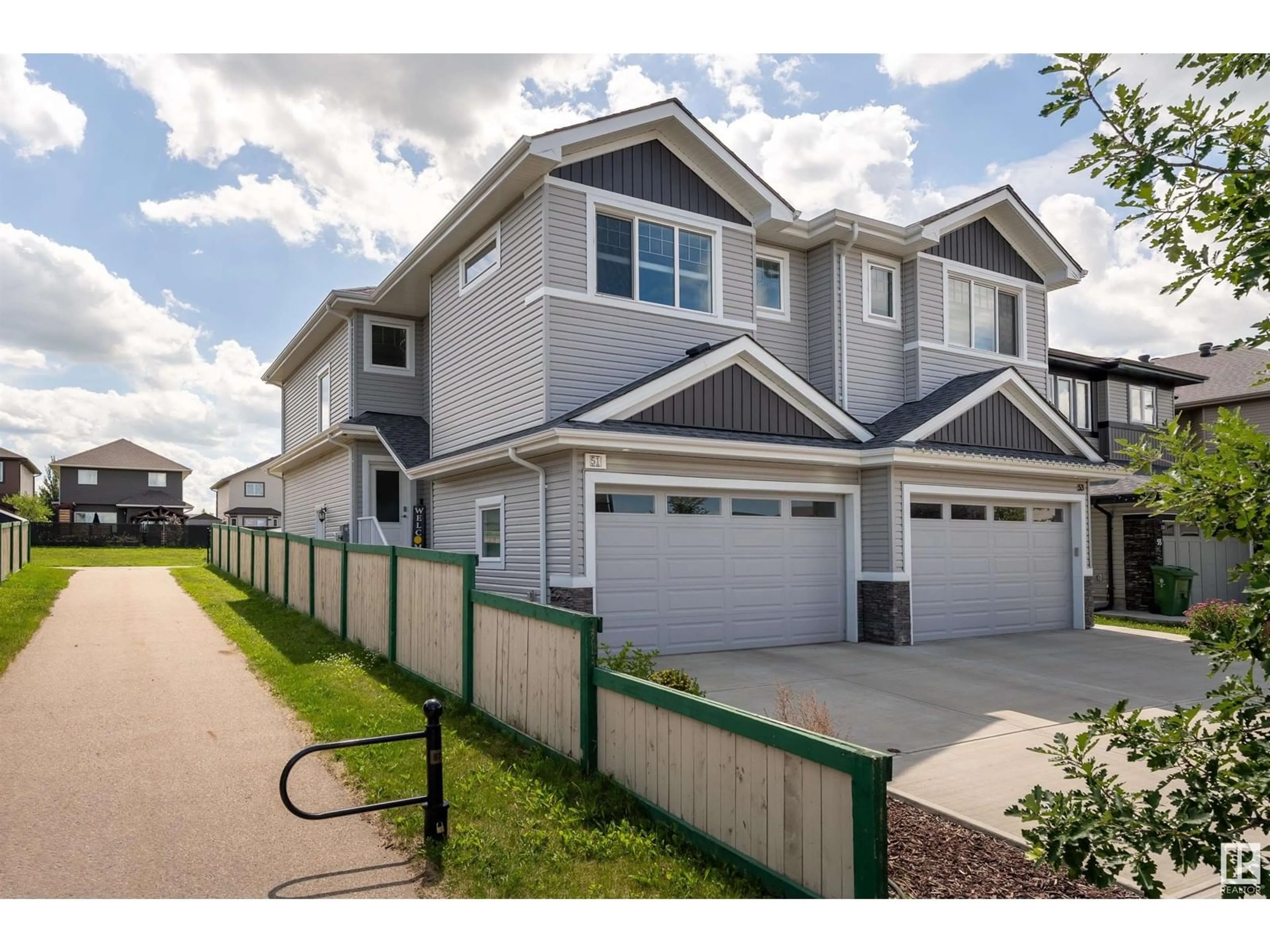 Home with vinyl exterior material, street for 51 ELM ST, Fort Saskatchewan Alberta T8L0R8