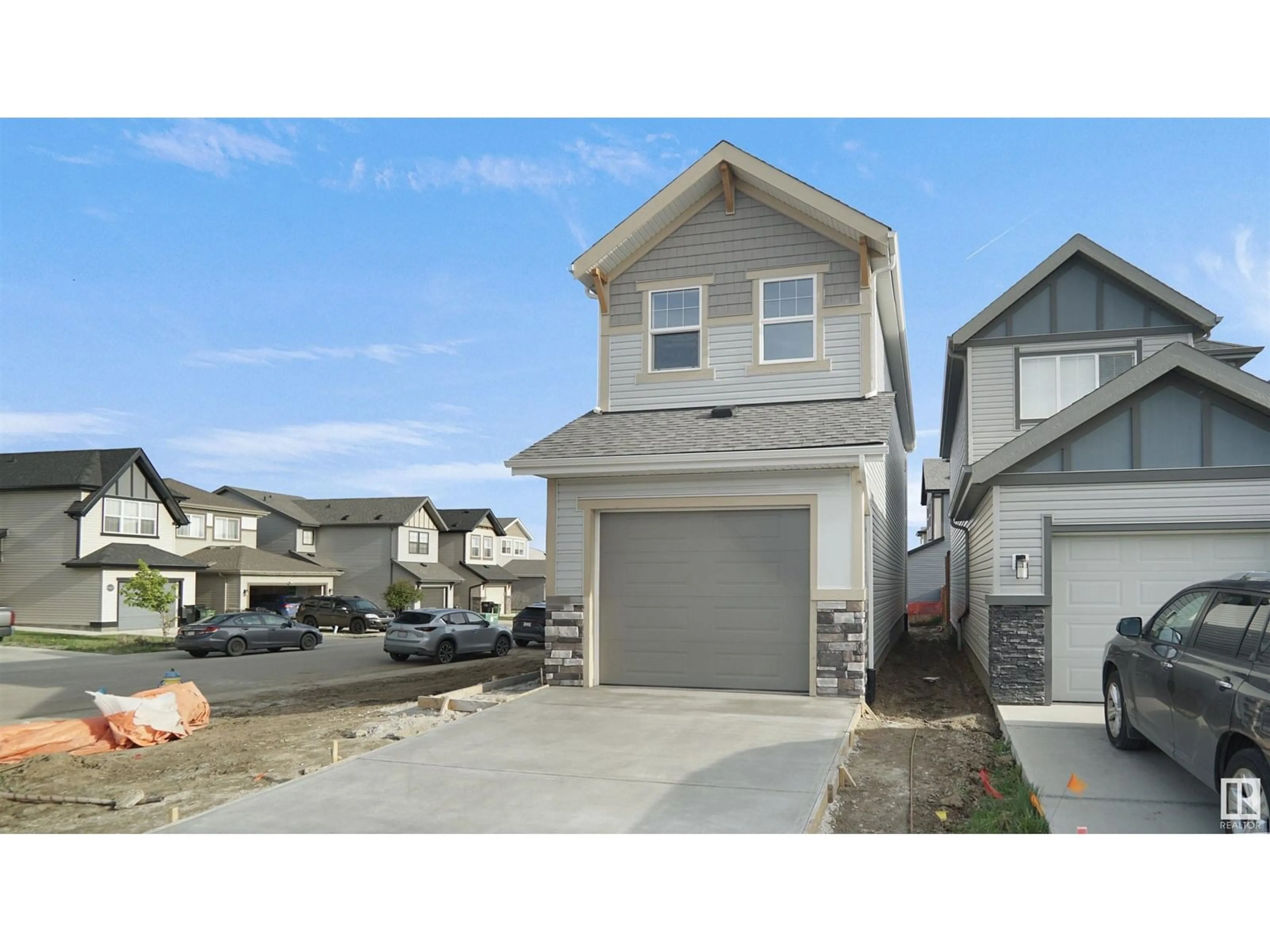 Home with vinyl exterior material, street for 22830 95A AV, Edmonton Alberta T5T7H5