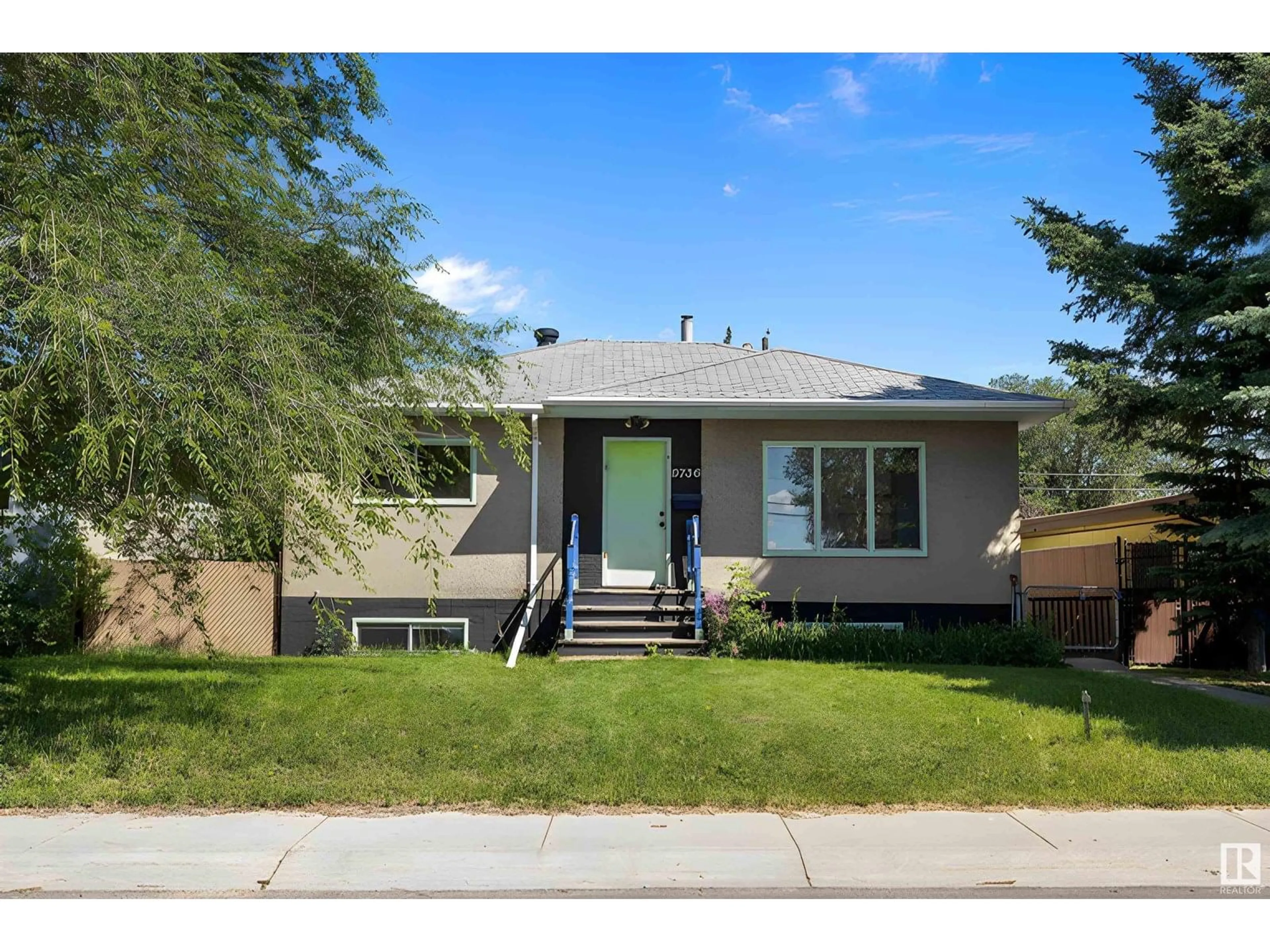 Home with vinyl exterior material, street for 9736 63 AV, Edmonton Alberta T6E0G6